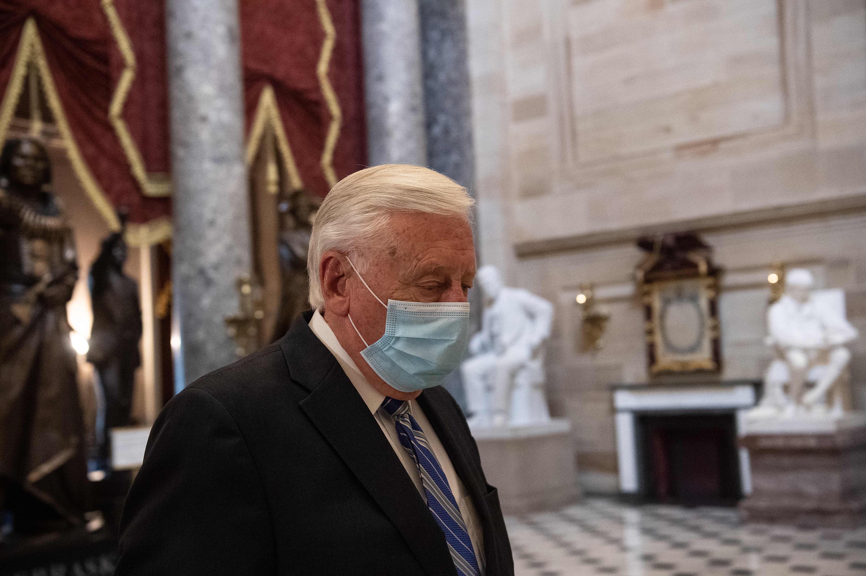 Rep. Steny Hoyer wears a face mask as he walks out of the House chamber at the US Capitol in April.