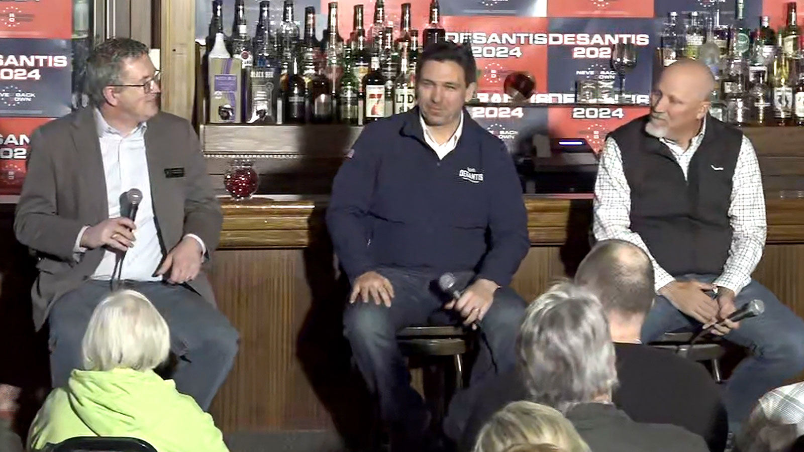 Republican presidential candidate Ron DeSantis appears at a campaign event at the Elk Lodge in Decorah, Iowa, with Kentucky Rep. Thomas Massie and Texas Rep. Chip Roy.