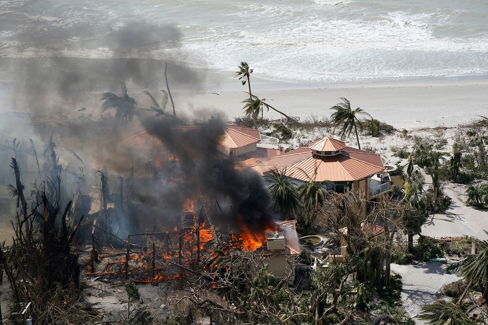A home burns on Sanibel Island on Thursday. 