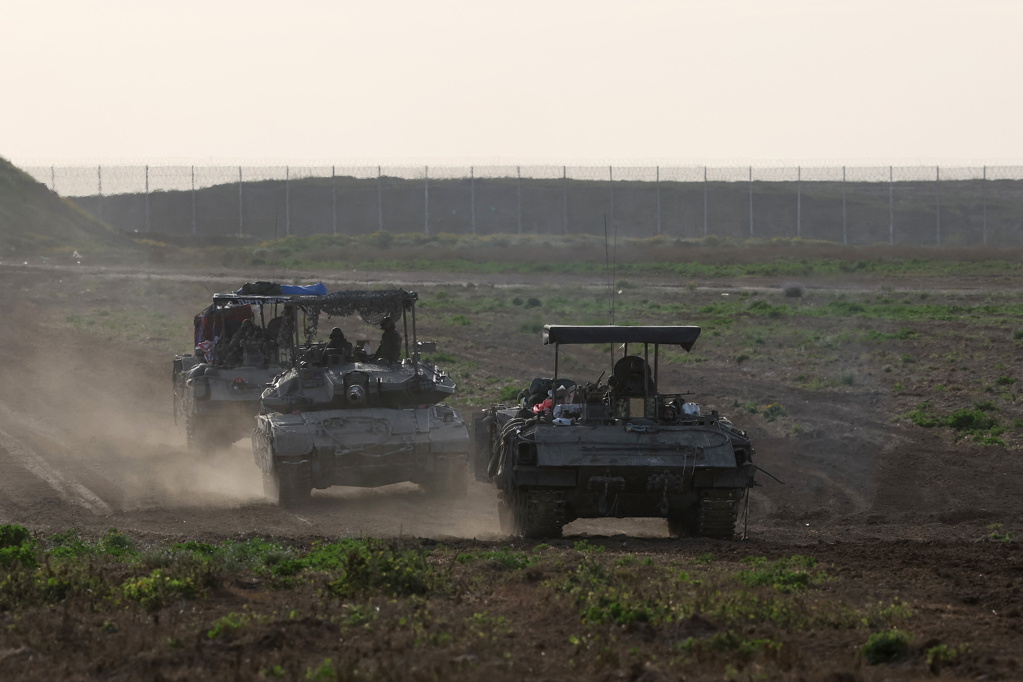 Israeli military vehicles are seen exiting Gaza on March 7.