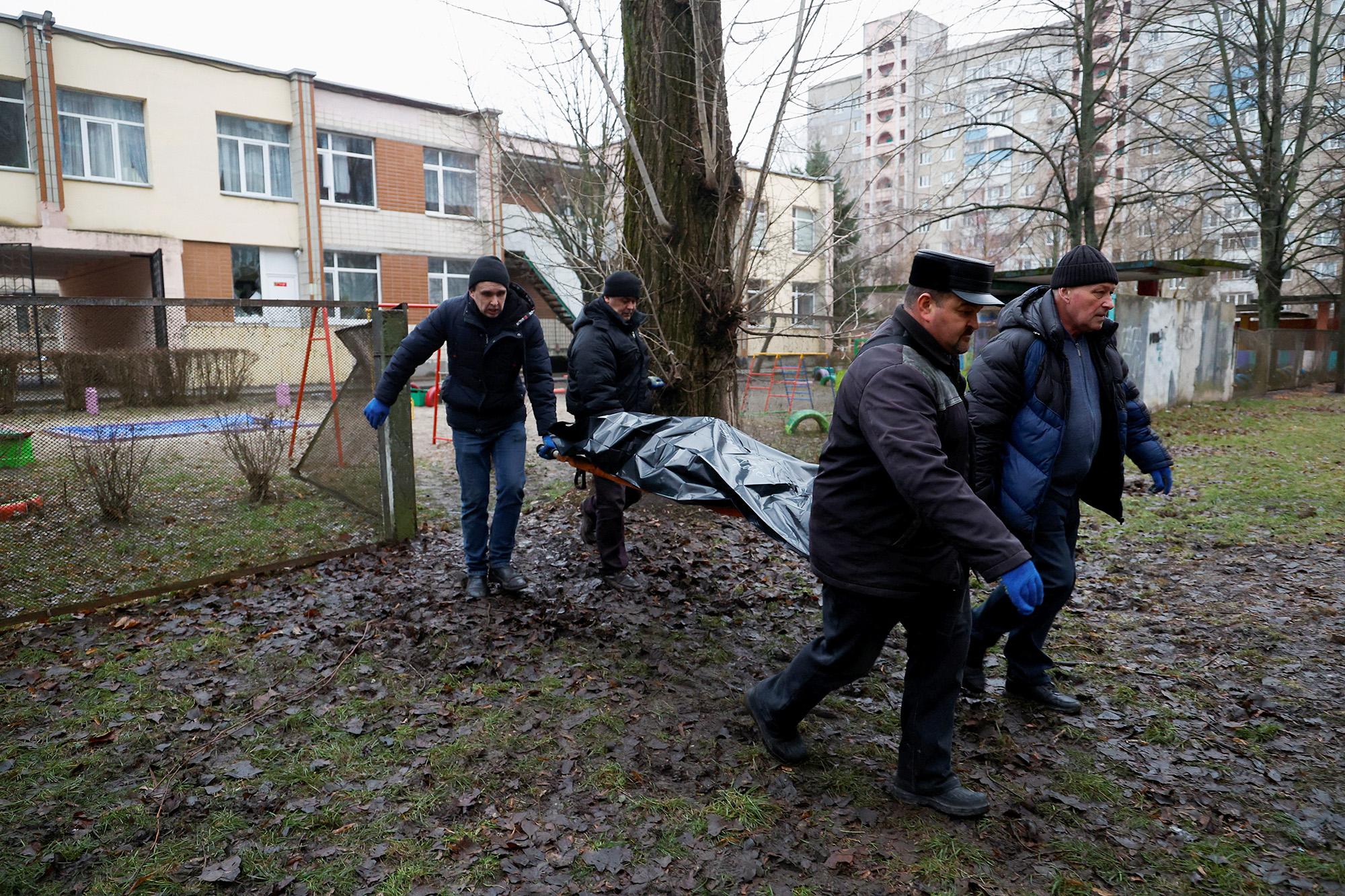 Bodies of victims at the site of the Brovary helicopter crash, are removed from the site on January 18.