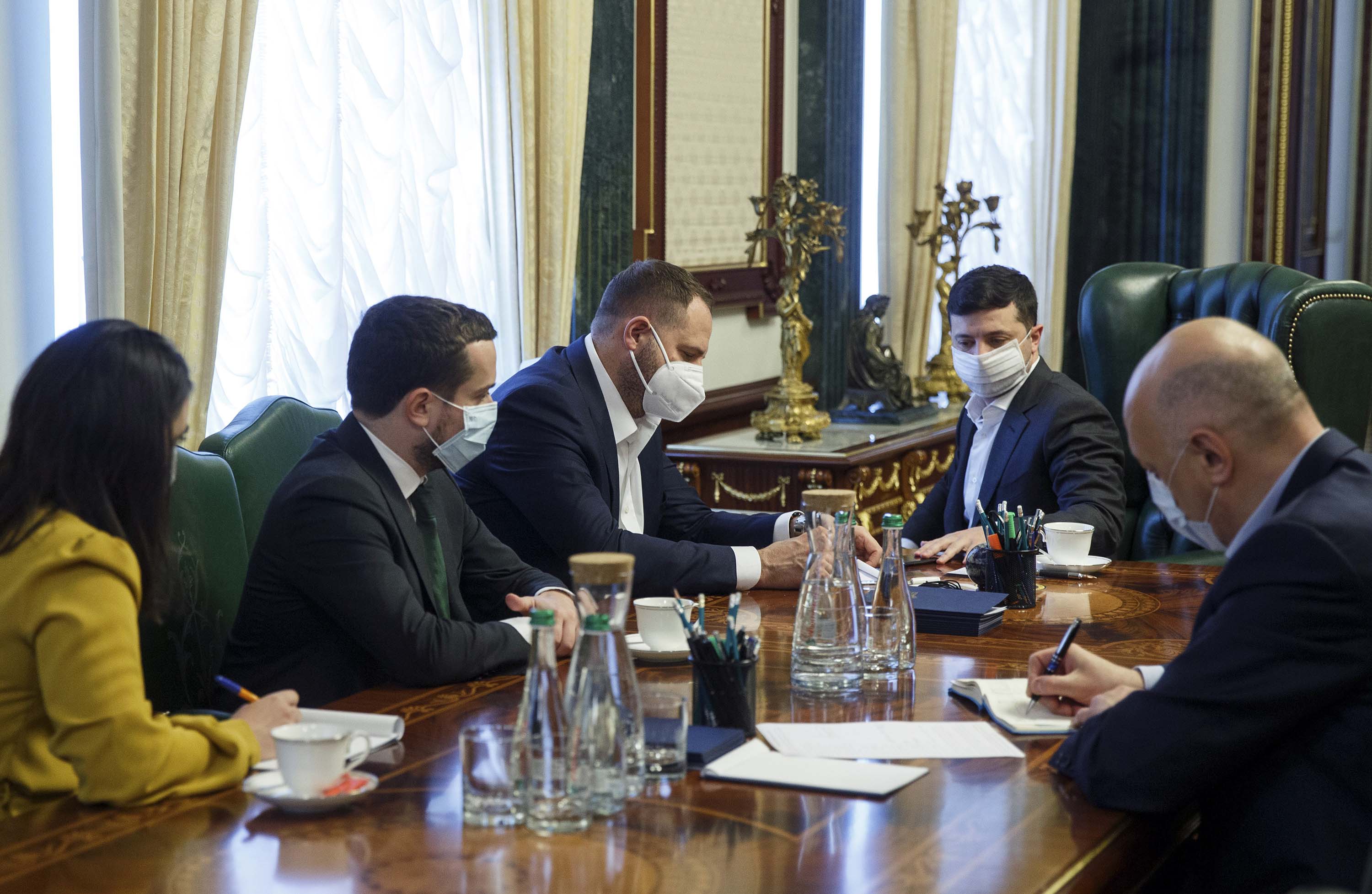 Ukrainian President Volodymyr Zelensky, second from right, is pictured during a meeting with officials at his office in Kiev, Ukraine, on April 21.