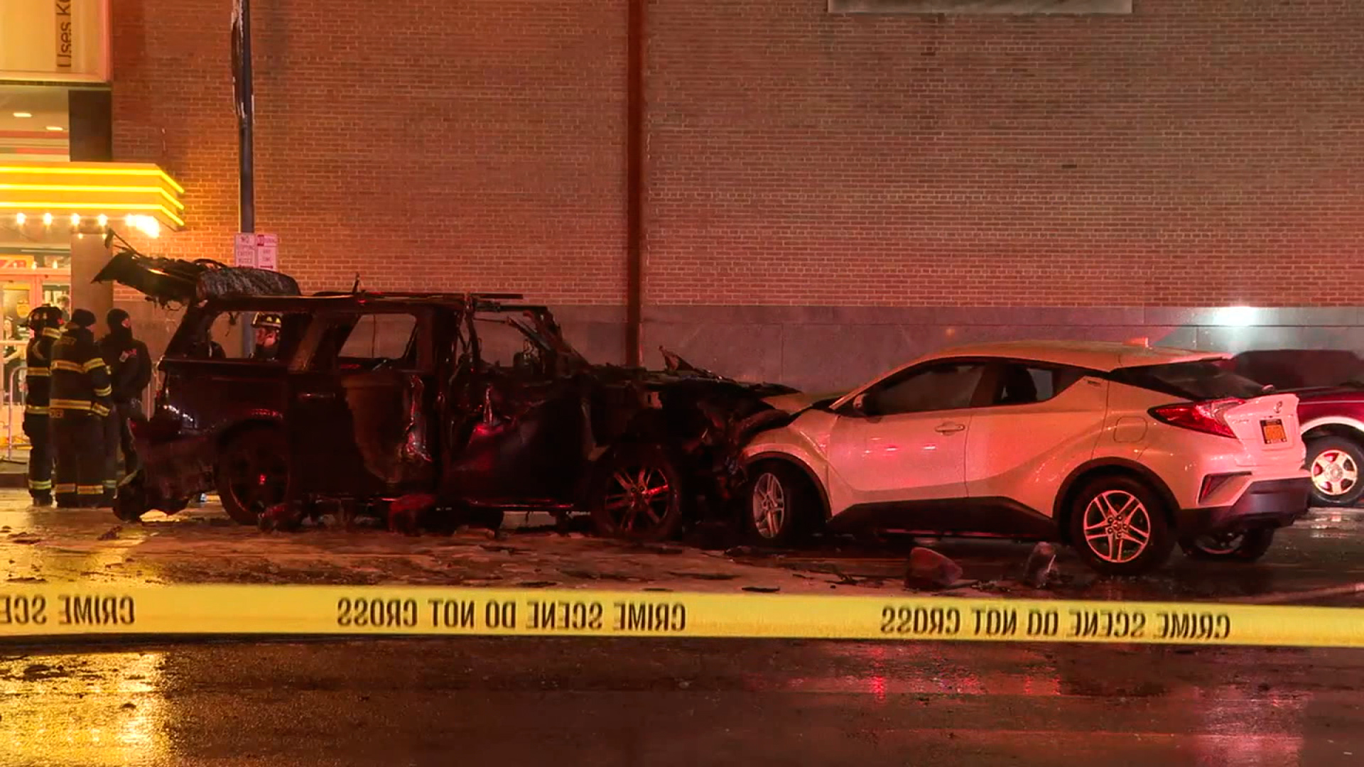 Emergency responders work the scene of a crash outside the Kodak Center in Rochester, New York, on Monday.