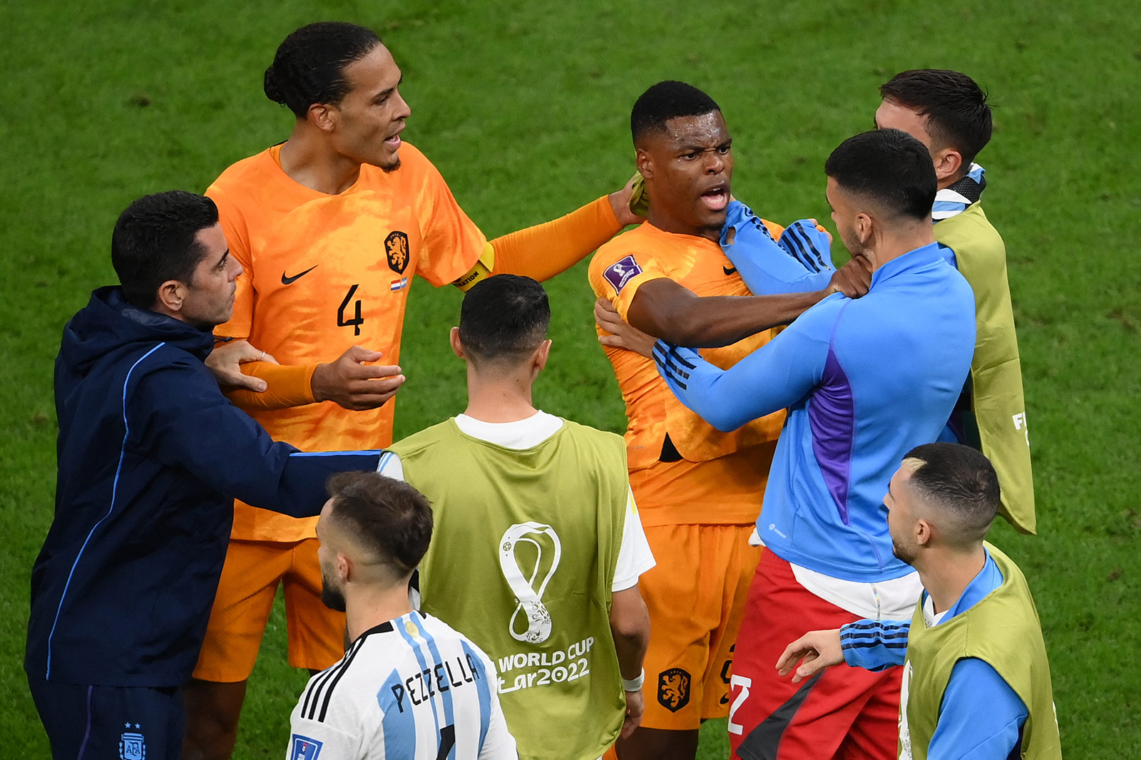 Netherlands and Argentina players clash during their match on December 9. 