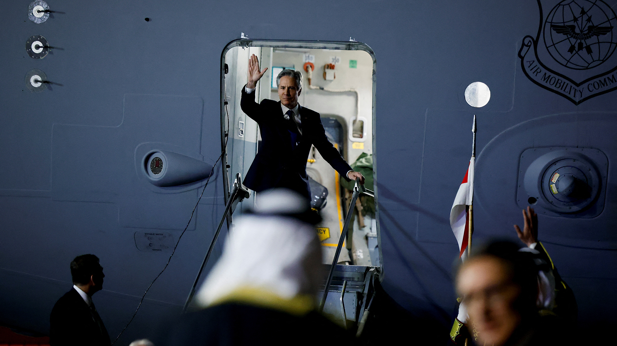 U.S. Secretary of State Antony Blinken boards a plane as he departs for Tel Aviv in Manama, Bahrain, on January 10.