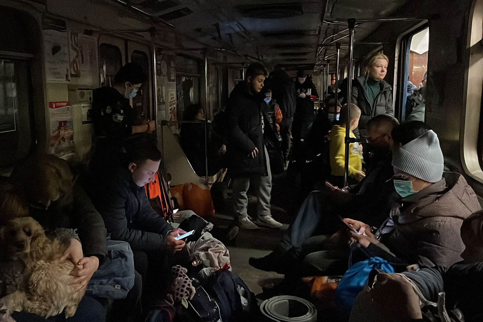 People shelter in a subway station in Kharkiv, Ukraine, on February 24.