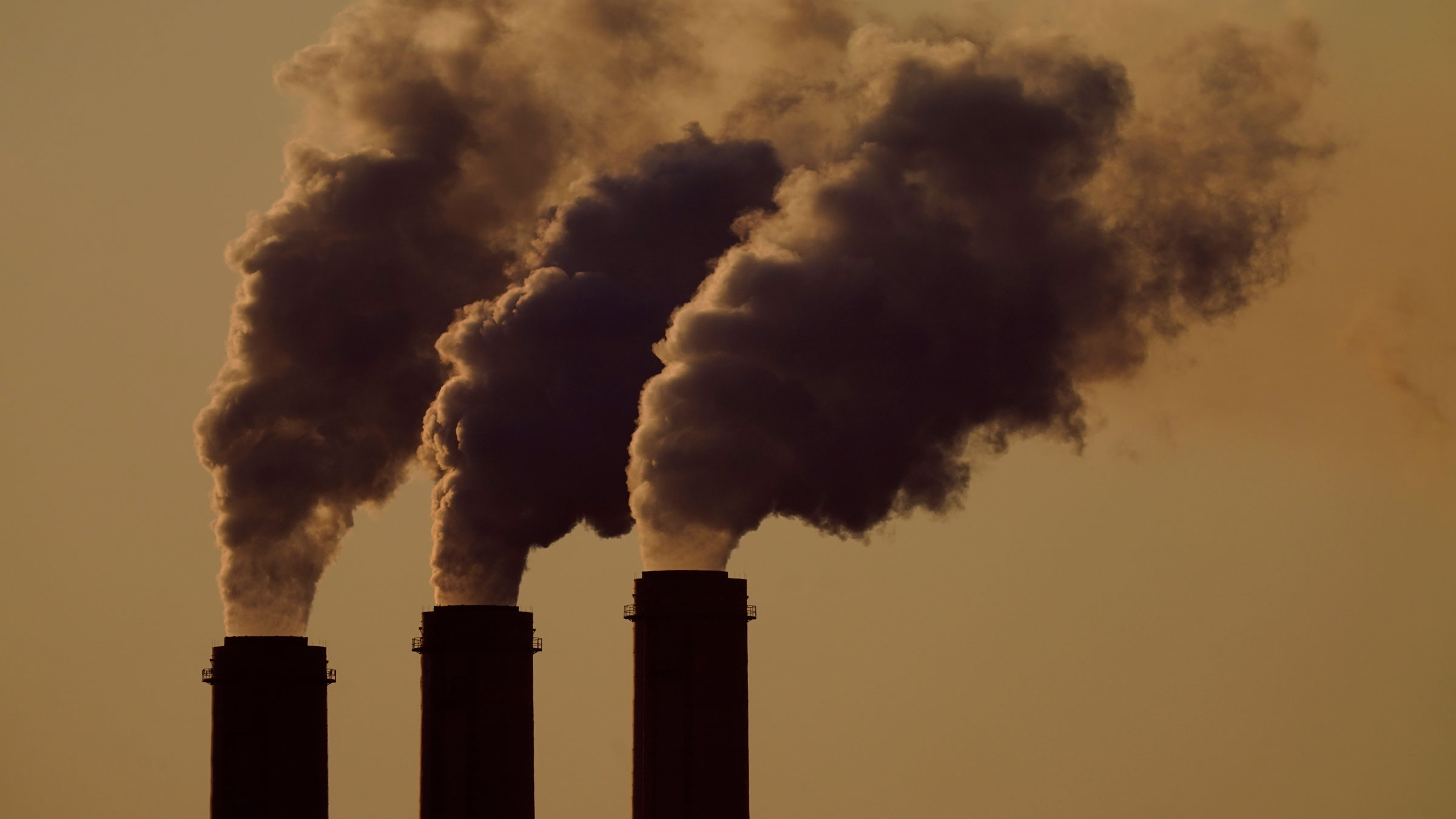 Emissions rise from the smokestacks at the Jeffrey Energy Center coal power plant near Emmett, Kansas, in September 2021.