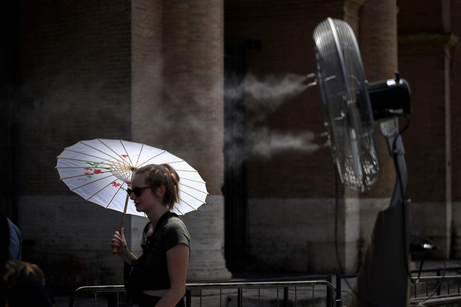 People cool down during an ongoing heat wave in Rome on July 17.