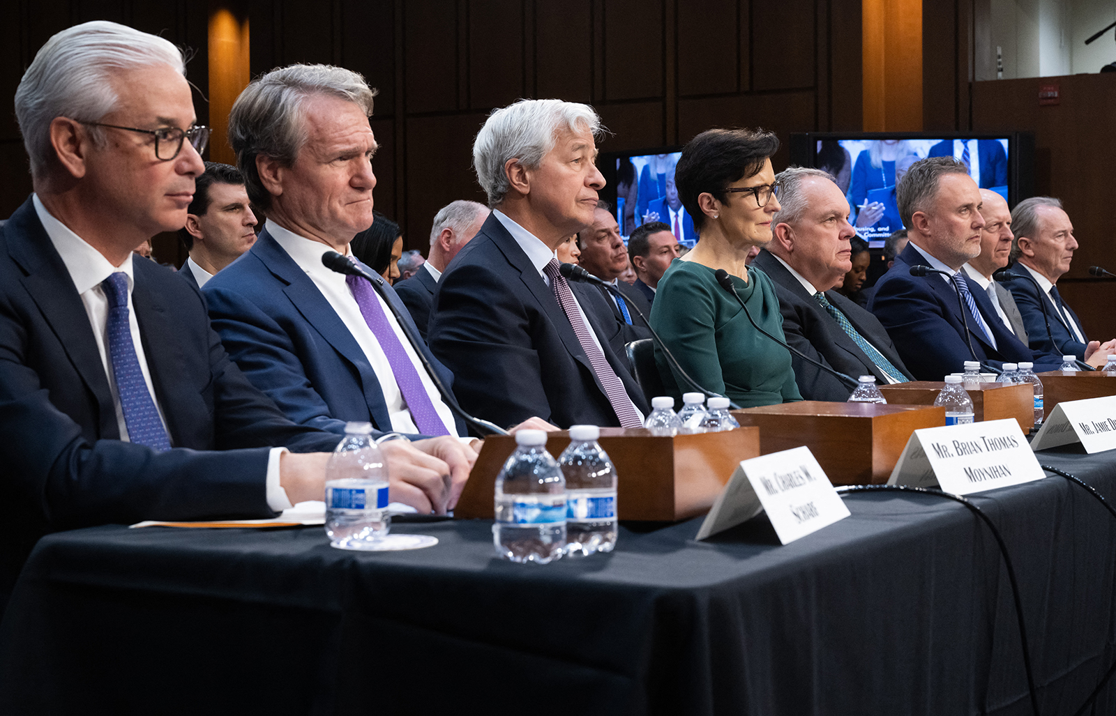 (L-R) Wells Fargo CEO and President Charles Scharf, Brian Bank of America Chairman and CEO Thomas Moynihan, JPMorgan Chase Chairman and CEO Jamie Dimon, Citigroup CEO Jane Fraser, State Street CEO Ronald OÕHanley, BNY Mellon CEO Robin Vince, Goldman Sachs CEO David Solomon and Morgan Stanley CEO James Gorman, testify during a Wall Street oversight hearing by the Senate Banking, Housing, and Urban Affairs committee on Capitol Hill in Washington, DC, today.