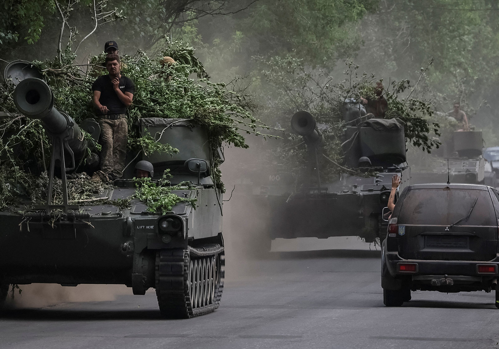 Ukrainian servicemen ride American 155 mm turreted self-propelled howitzers M109 in the Donetsk region, Ukraine, on June 13.
