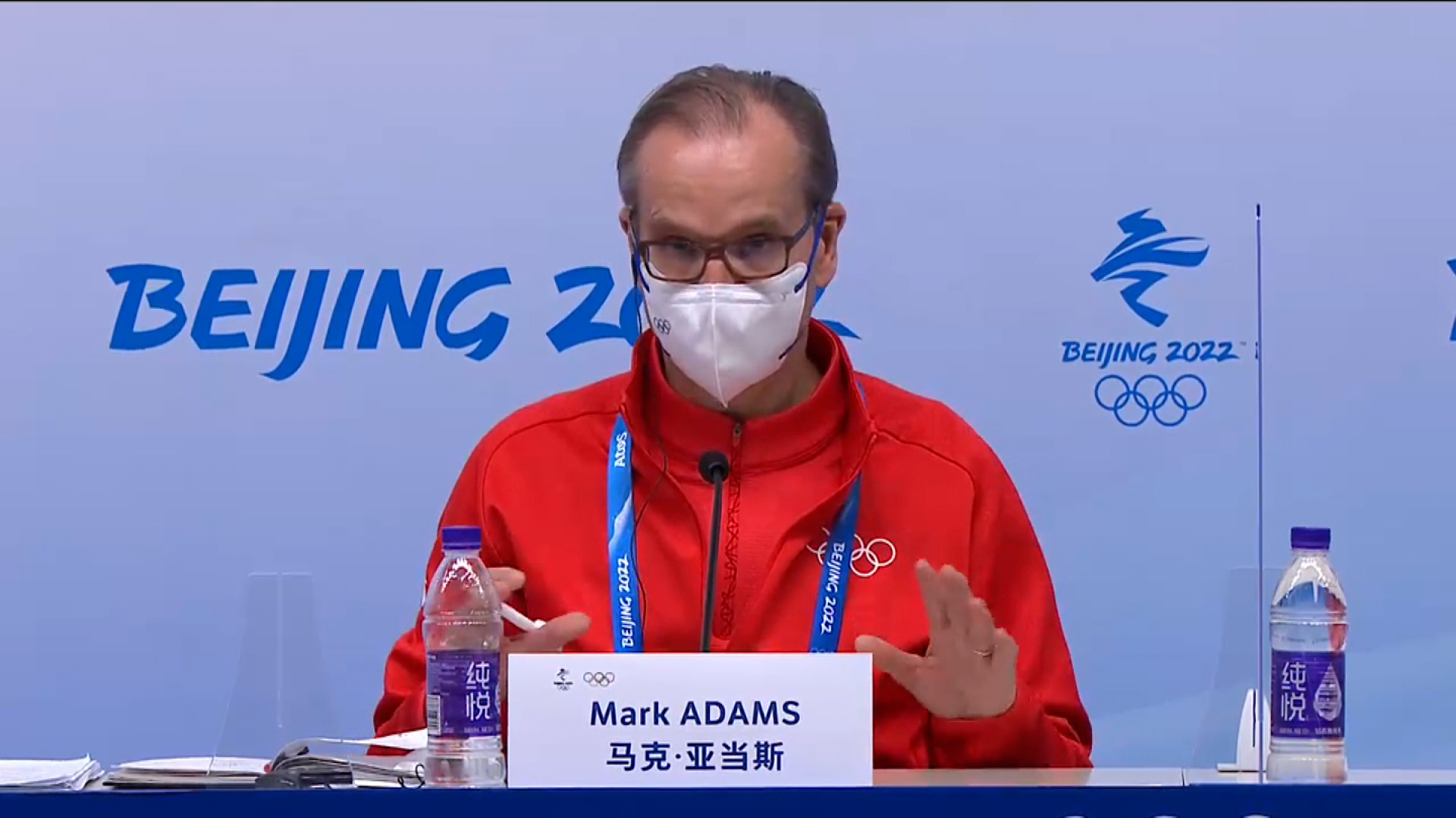  IOC spokesman Mark Adams speaking at a press briefing on February 9.