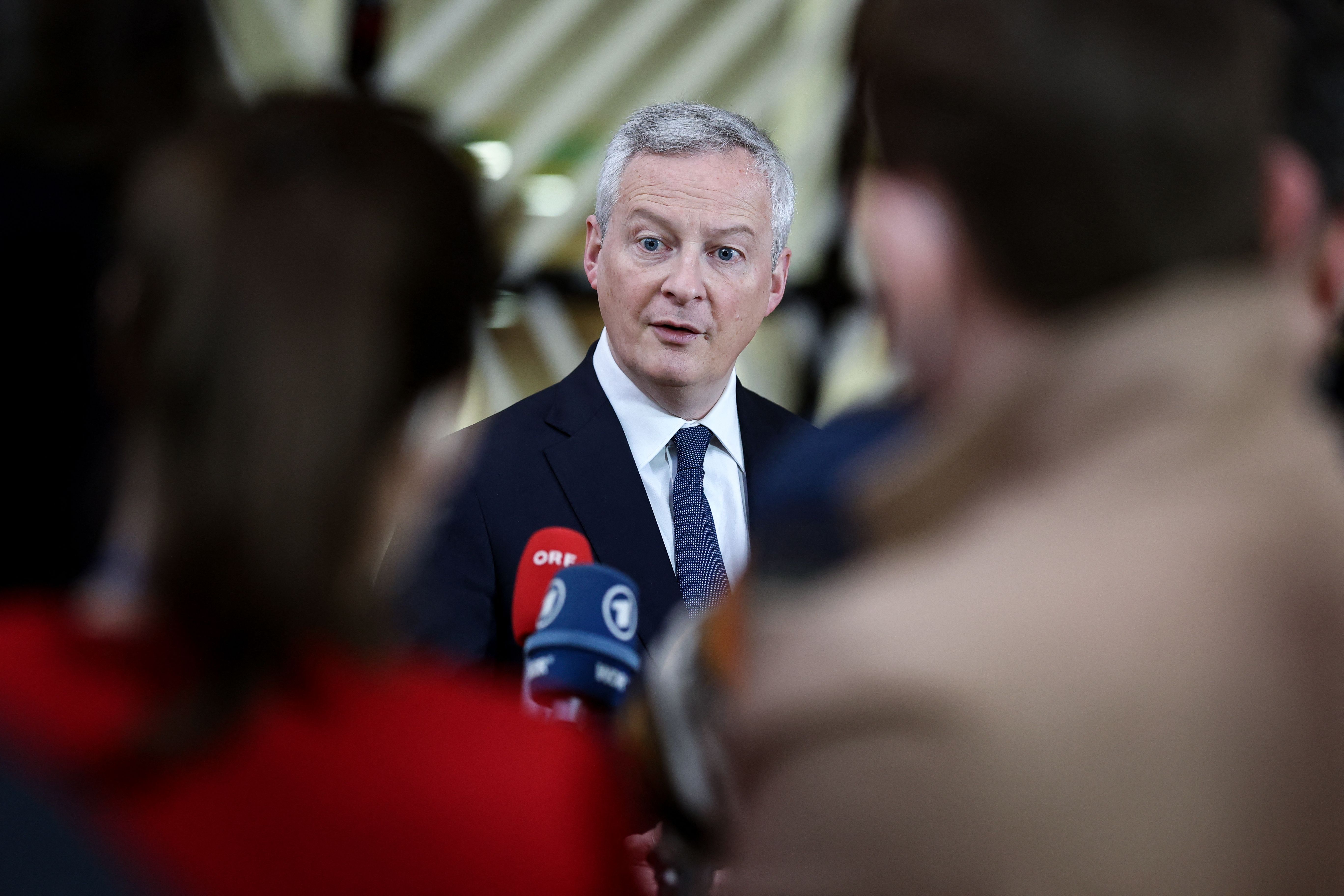 French Finance Minister Bruno Le Maire answers journalists' questions at the EU headquarters in Brussels, Belgium, on March 15.