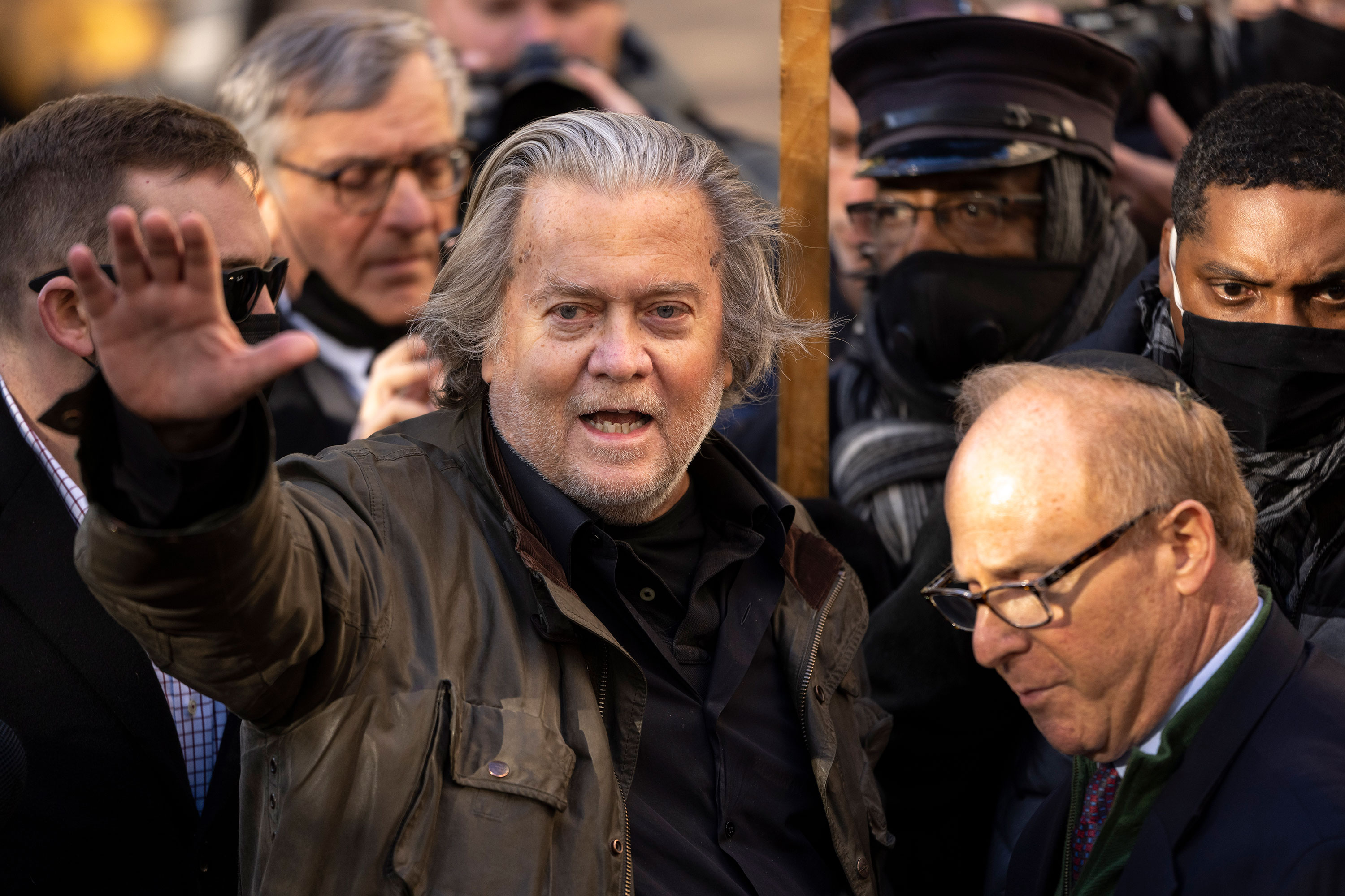 Steve Bannon waves after speaking to the press in November 2021 in Washington, DC.