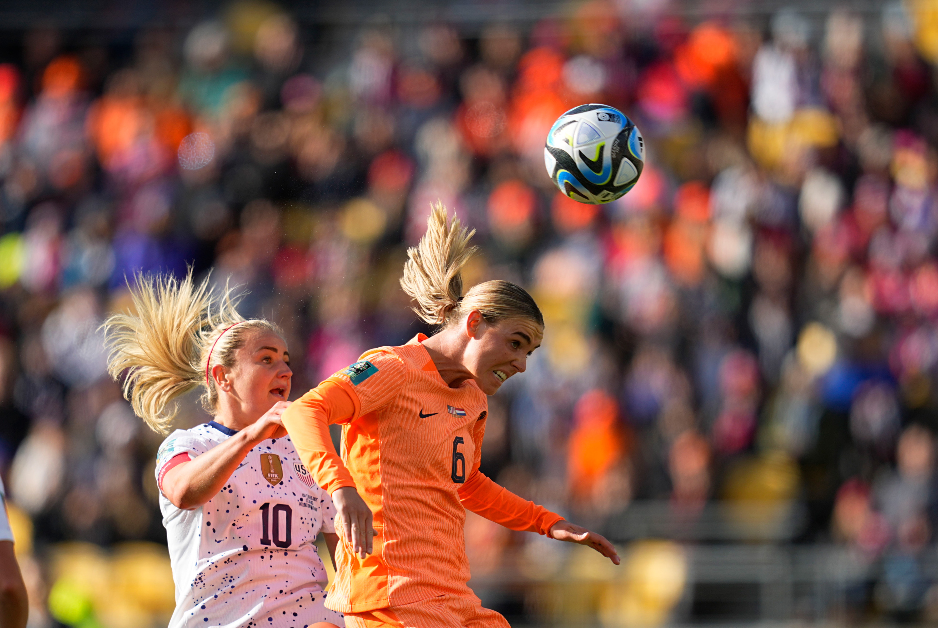USA's Lindsey Horan and Netherlands' Jill Roord battle for the ball during their match on July 27. USA and Netherlands tied 1-1.
