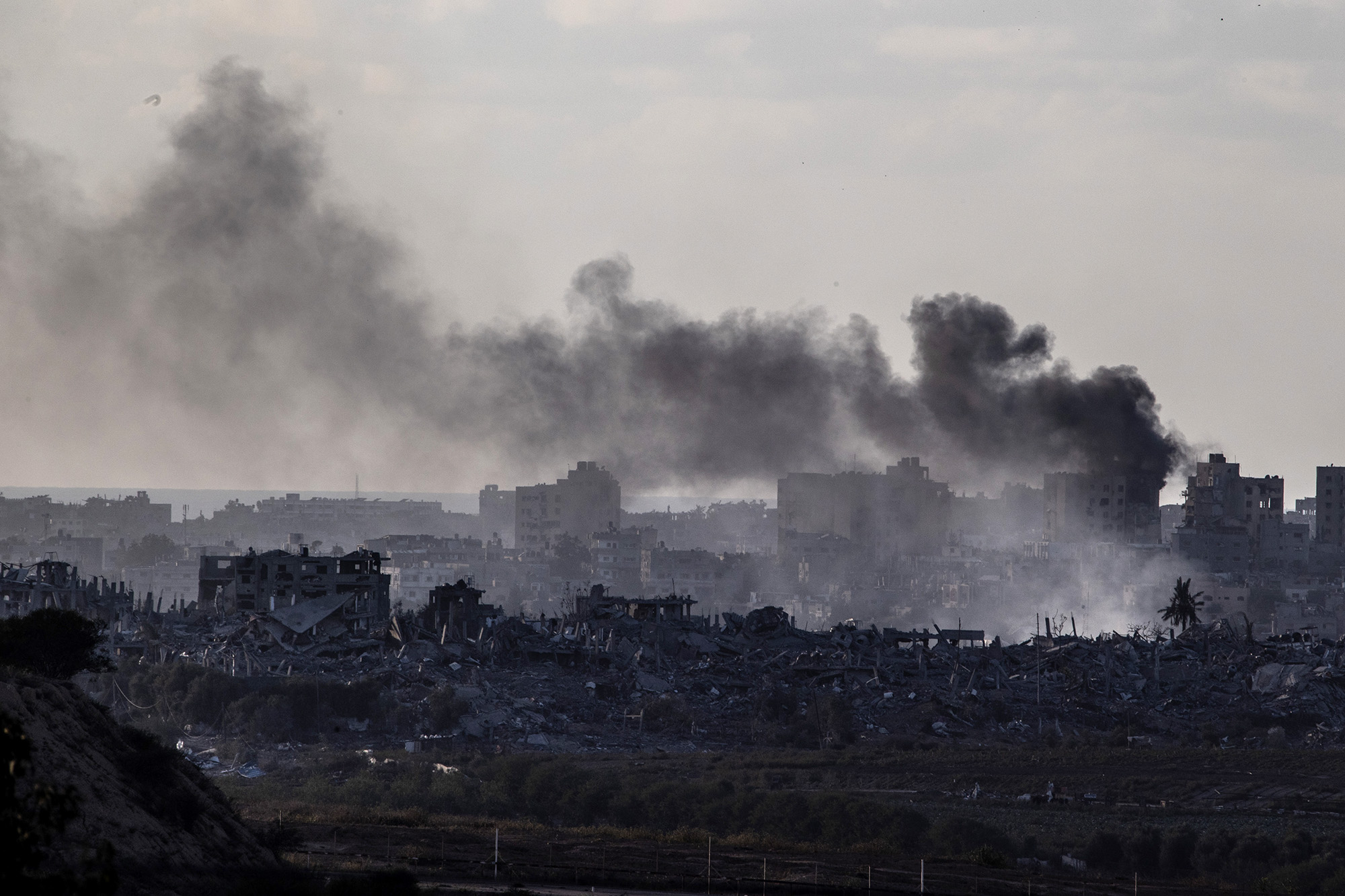 Smoke rises in Gaza as Israeli attacks continue on November 21.