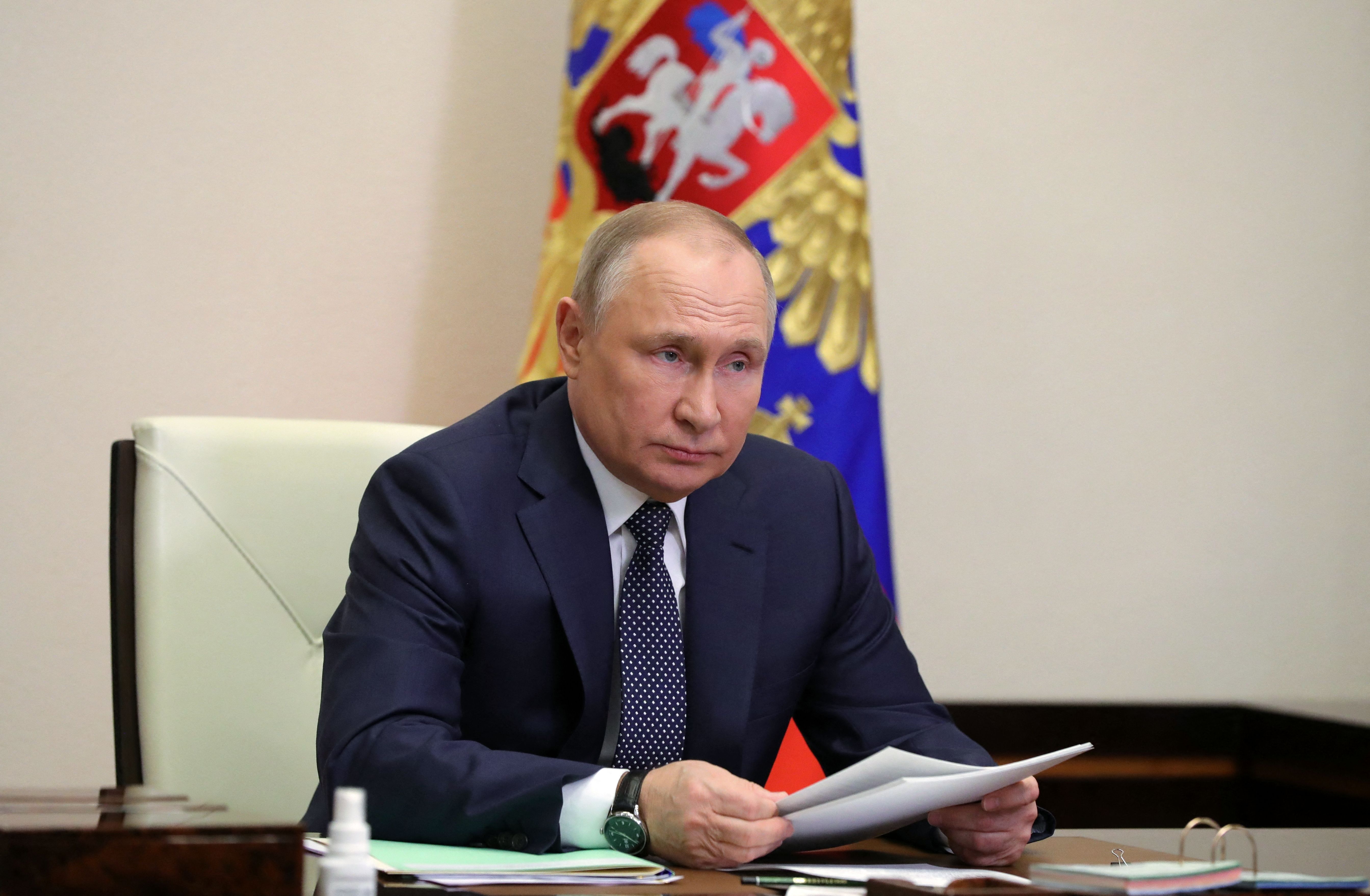 Russian President Vladimir Putin chairs a meeting on aviation via a video link at the Novo-Ogaryovo state residence outside Moscow, Russia, on March 31.
