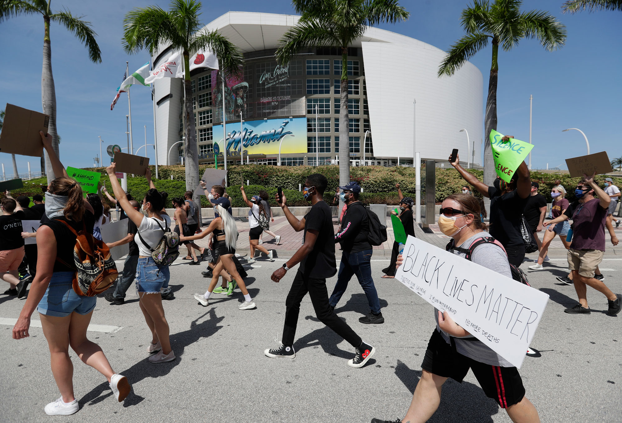 People in Miami protest George Floyd's death on Sunday, May 31.