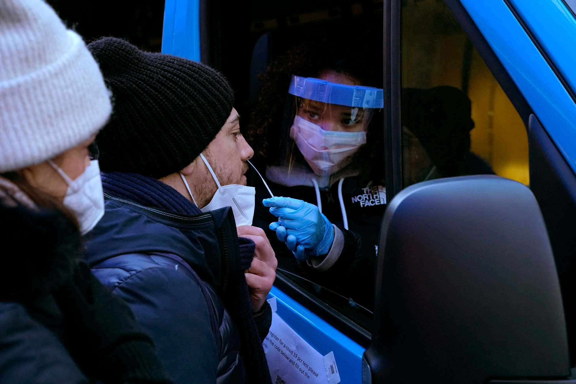 People get tested at a mobile Covid-19 testing van in Times Square on January 4, in New York City. 