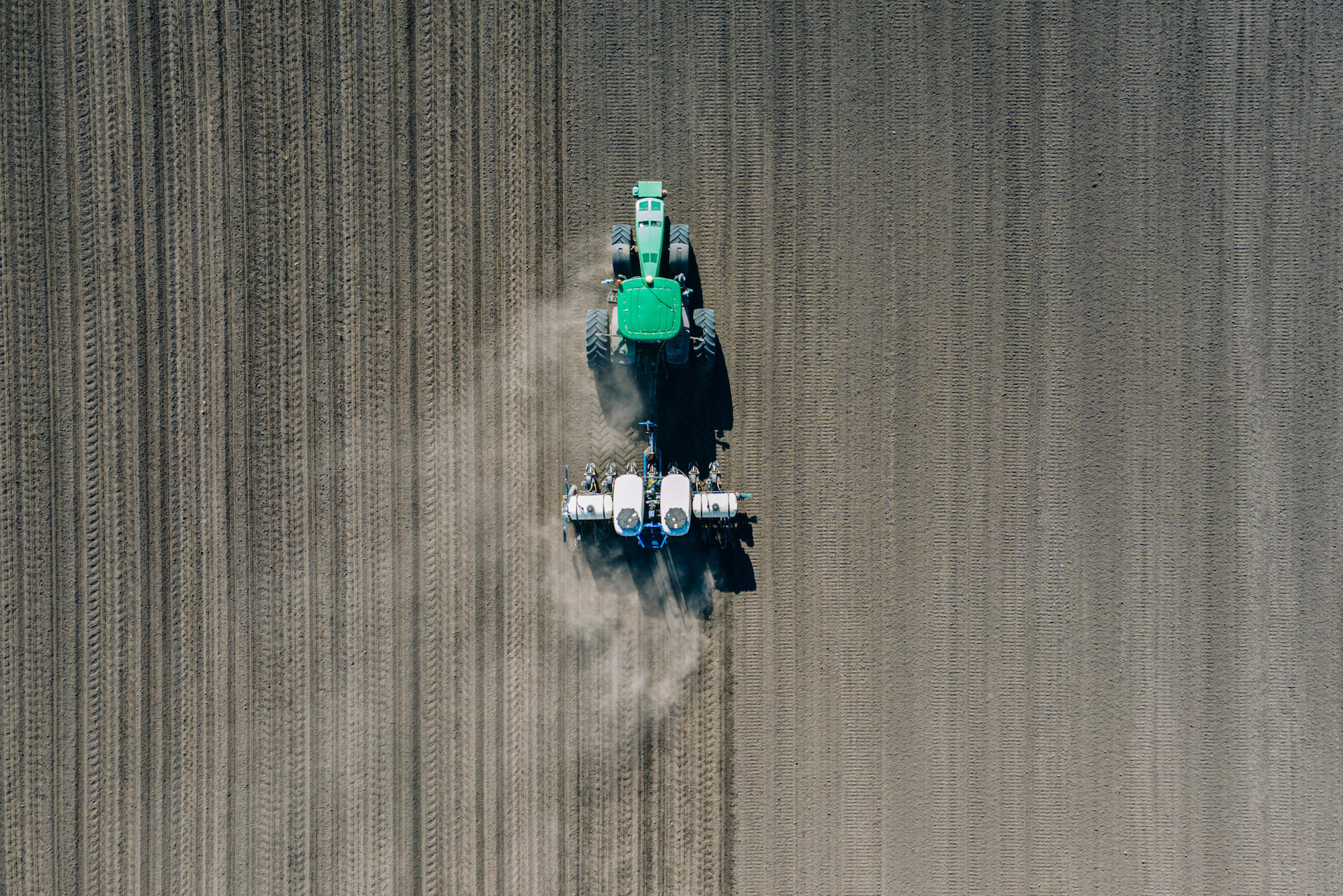 A tractor ploughs a field to plant sunflower seeds on a farm in Yemchykha, Ukraine, on May 1.