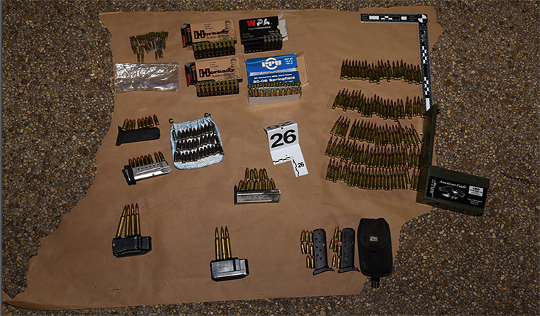 Guns and weapons that the DOJ says were found in the truck of Lonnie Coffman, who was indicted on weapons charges in connection with the events at the Capitol last week.
