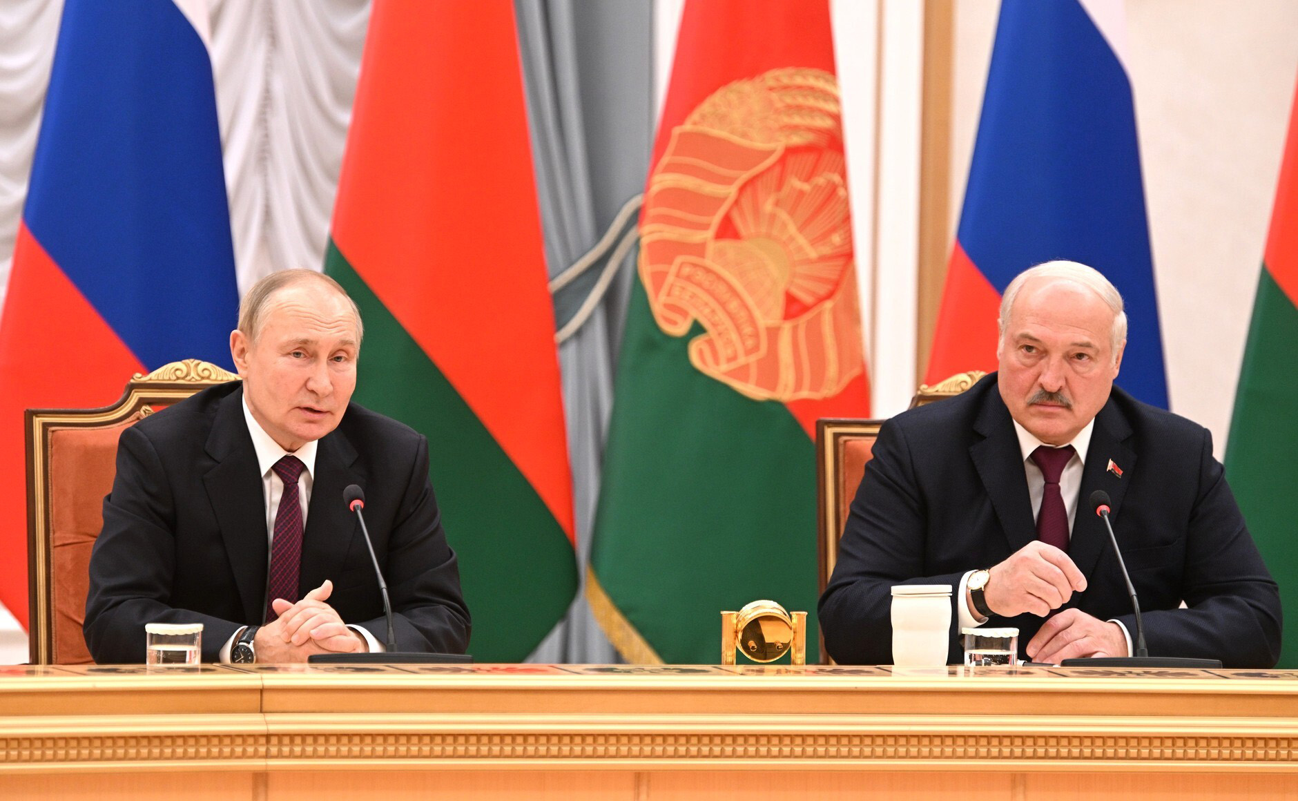 Russian President Vladimir Putin, left, and Belarusian President Alexander Lukashenko meet at the Palace of Independence in Minsk, Belarus, on December 19.