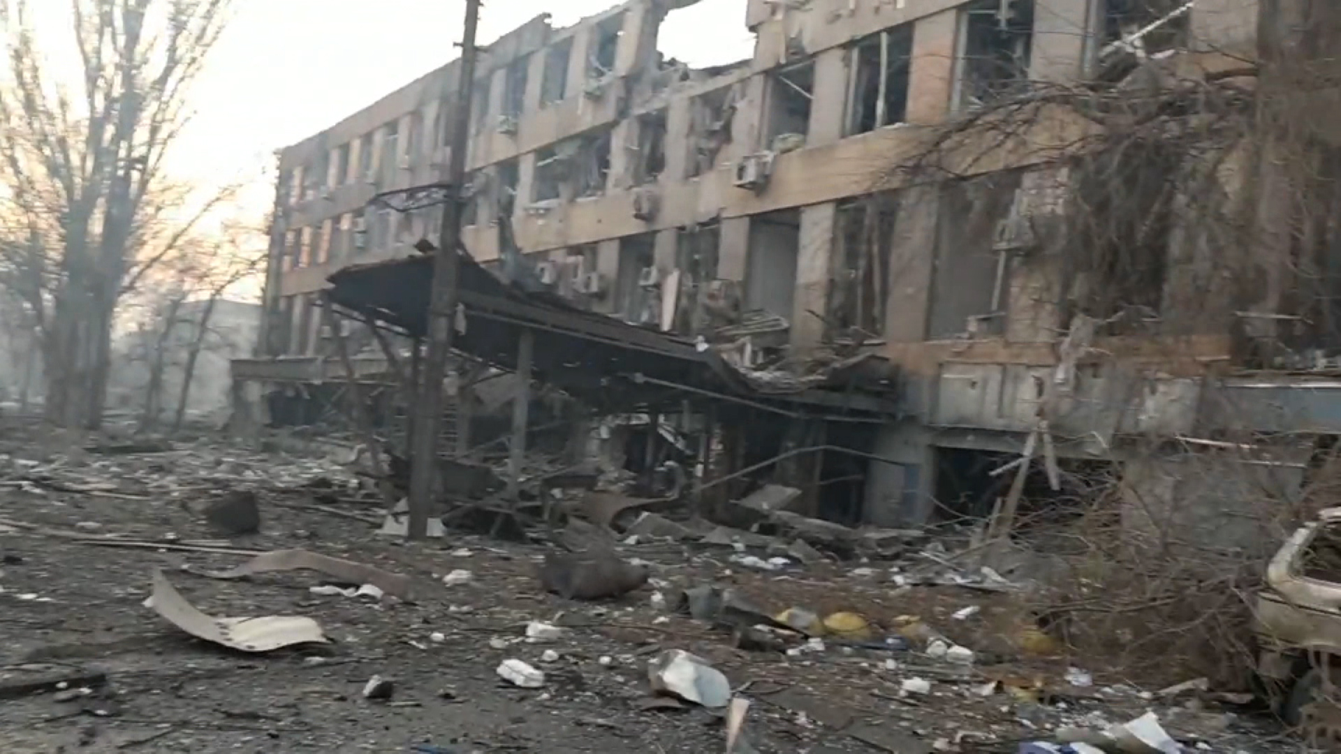 Destruction from a bombing at a city administration building and a university in Mariupol are seen in this image made from video.