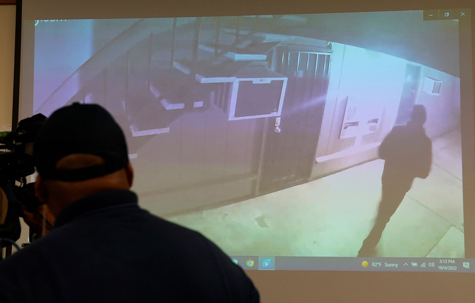 Stockton police show a brief video during a news conference on October 4 from a surveillance camera of what authorities described as a "person of interest" in the investigation into a series of killings.
