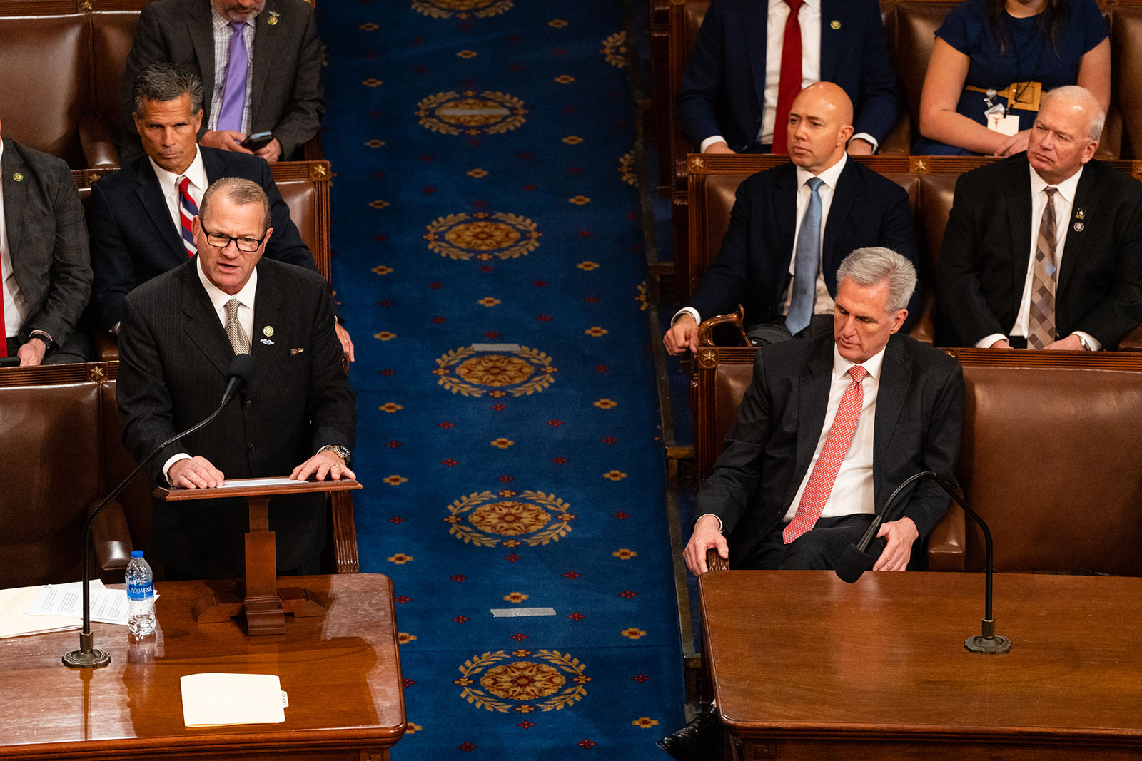 Rep. Troy Nehls, left, nominates Rep. Kevin McCarthy for House speaker on Thursday.