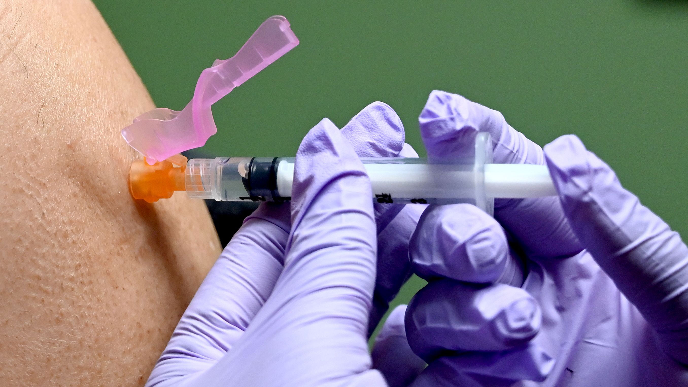 A man gets a flu shot in Washington, DC, in January.