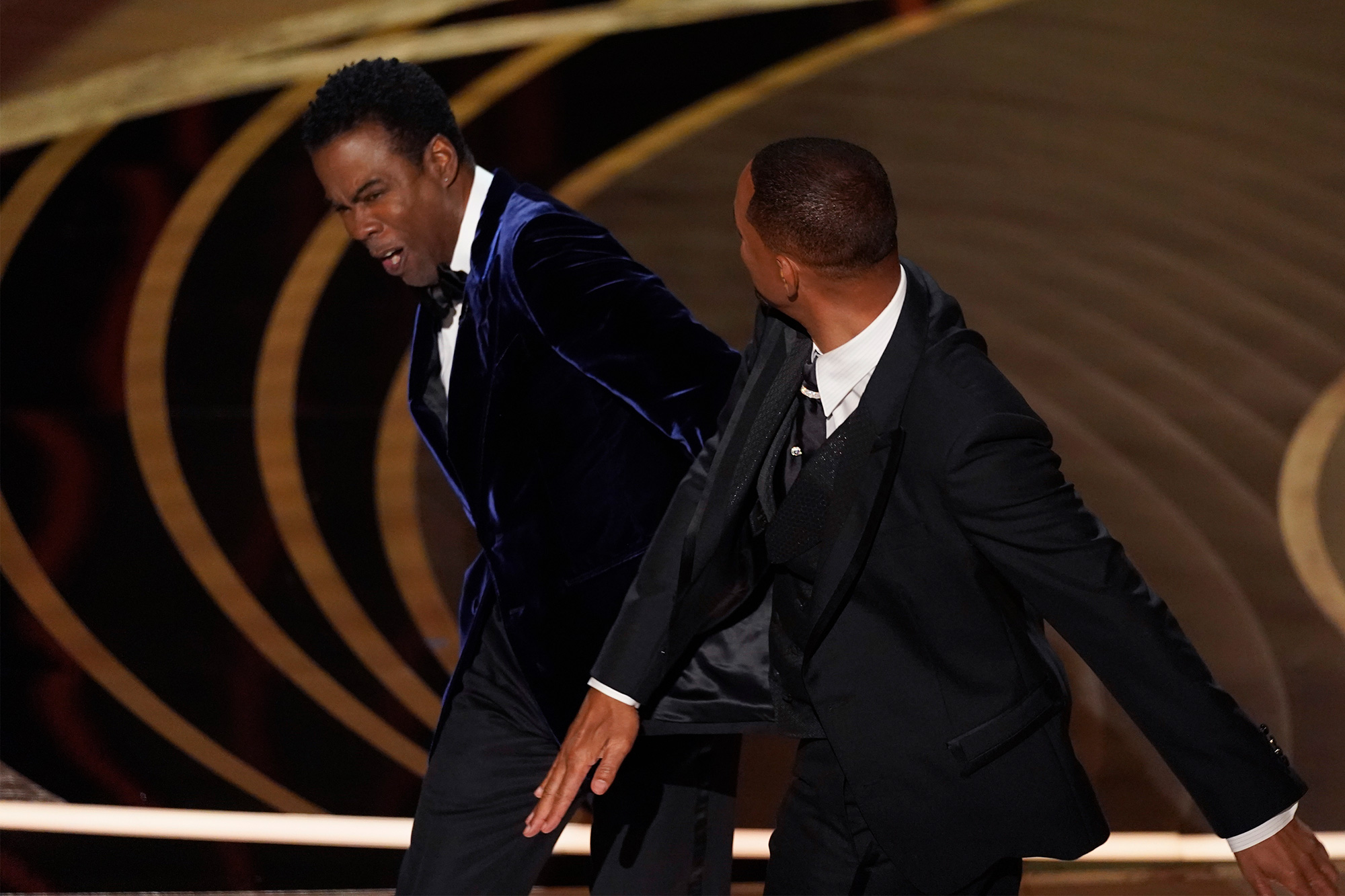 Chris Rock and Will Smith onstage at the 94th Academy Awards on Sunday March 27.