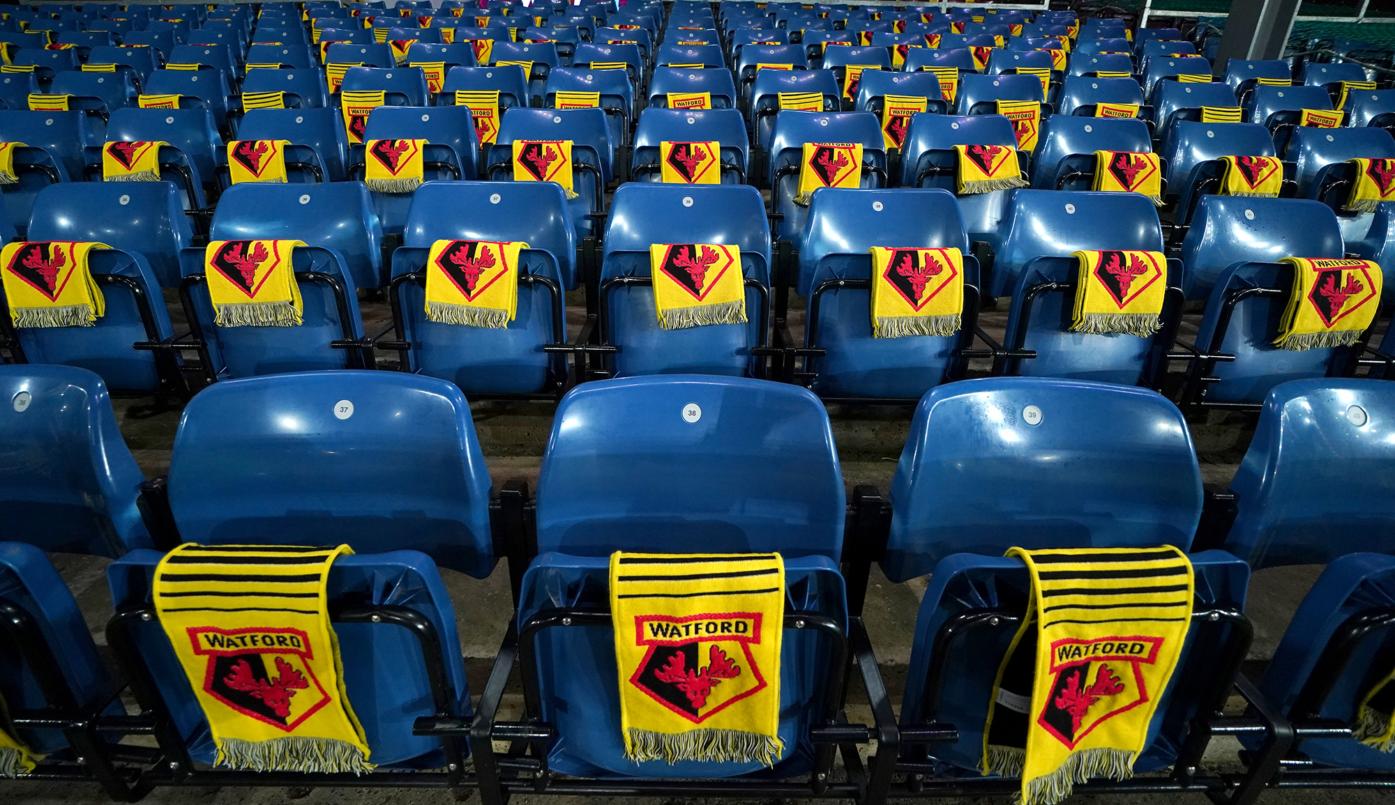 A general view of Watford scarves on the seats as tonights Premier League match at Turf Moor between Burnley and Watford has been postponed on December 15, 2021. 