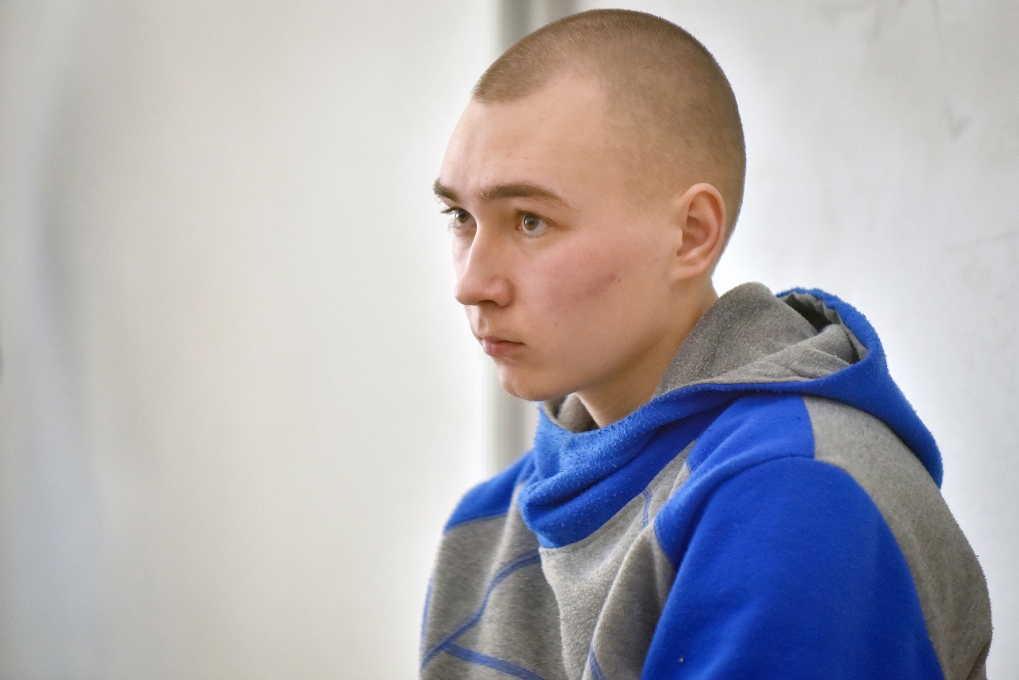 Russian serviceman Vadim Shishimarin sits in the dock on the second day of his war crimes trial in the Solomyansky district court in Kyiv, Ukraine, on 19 May.