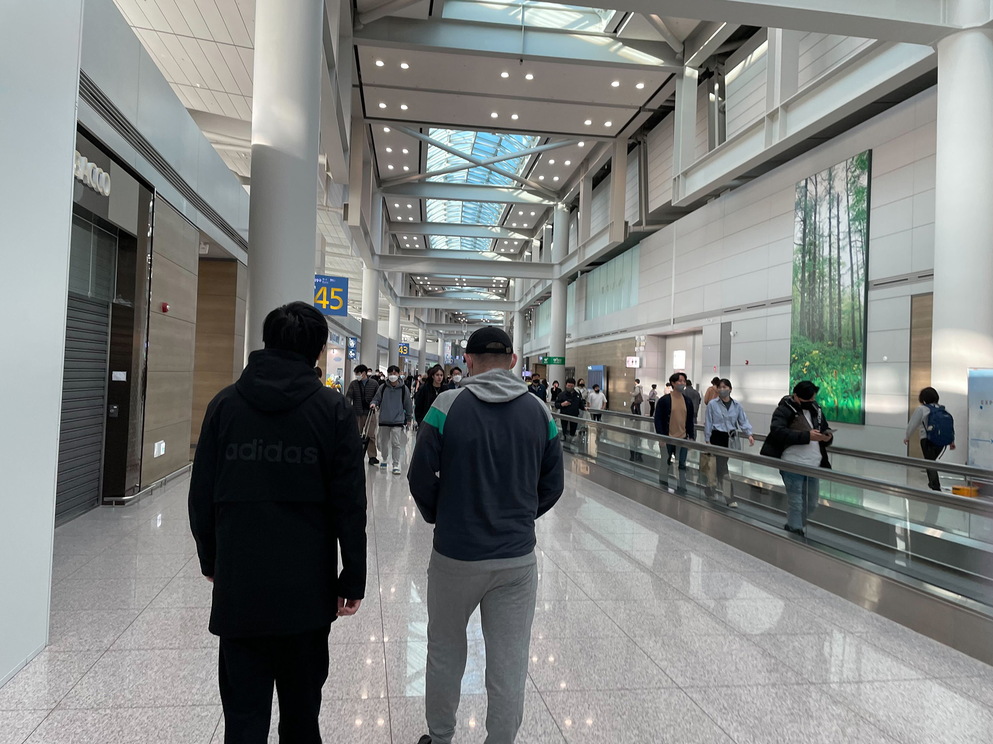 Two of the five Russians who arrived at South Korea's Incheon International Airport seeking refugee status after receiving their draft notice, but remain in limbo on January 24, in Incheon, South Korea.