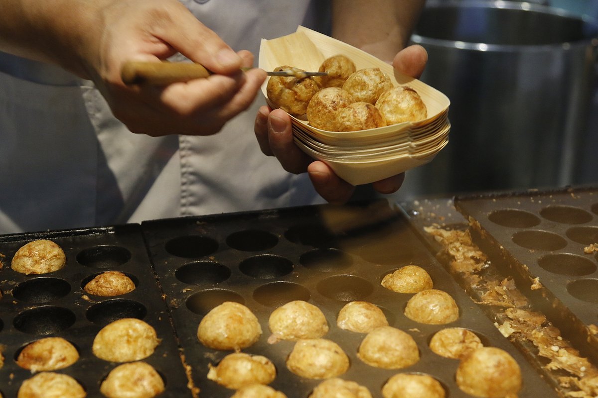 Takoyaki, a classic Osaka dish of batter balls filled with octopus.