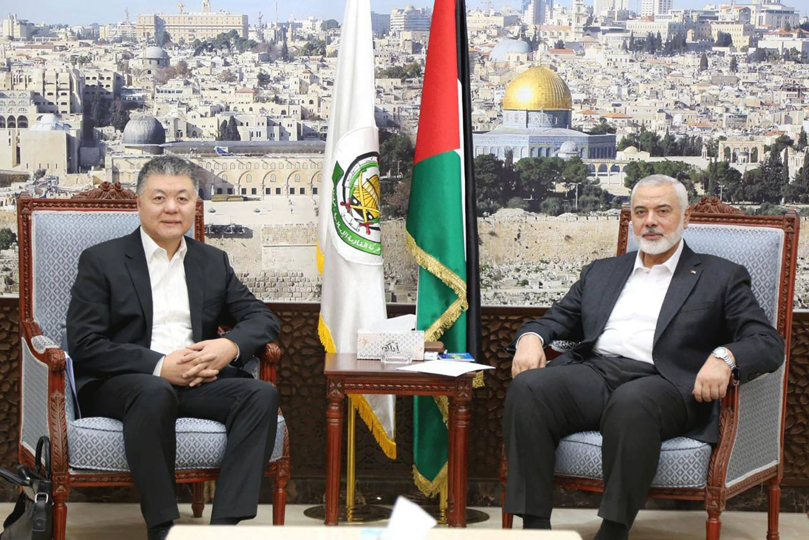 Hamas leader Ismail Haniyeh meets Wang Kejian, an envoy of the Chinese Foreign Ministry, in Qatar on March 17.