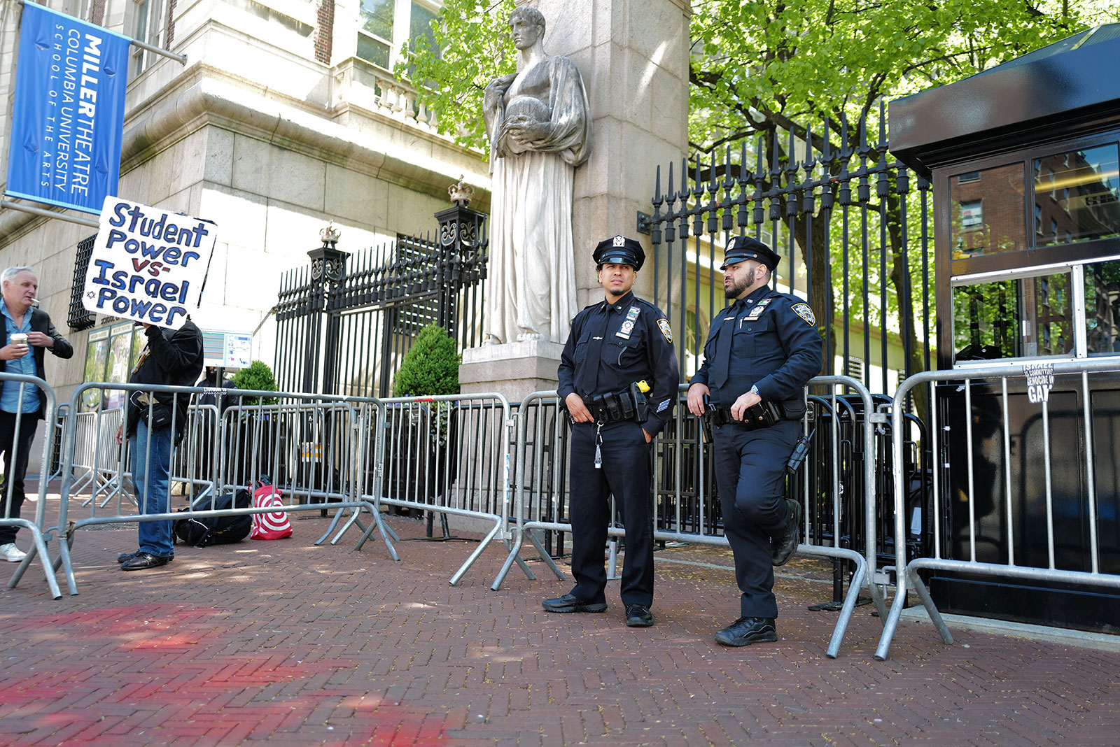 NYPD officers stand at the entrance of Columbia University in New York City on Wednesday May 1.