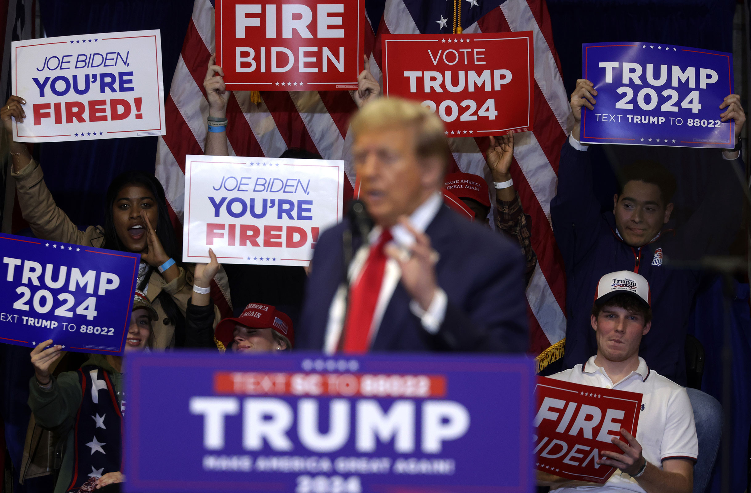 Supporters cheer as former President Donald Trump speaks during a campaign event at the Winthrop Coliseum on February 23, in Rock Hill, South Carolina. 