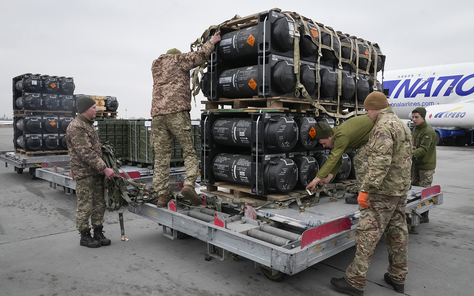 Ukrainian servicemen unpack Javelin anti-tank missiles, delivered as part of the US security assistance to Ukraine, at the Boryspil airport, Kyiv, Ukraine, on February 11.