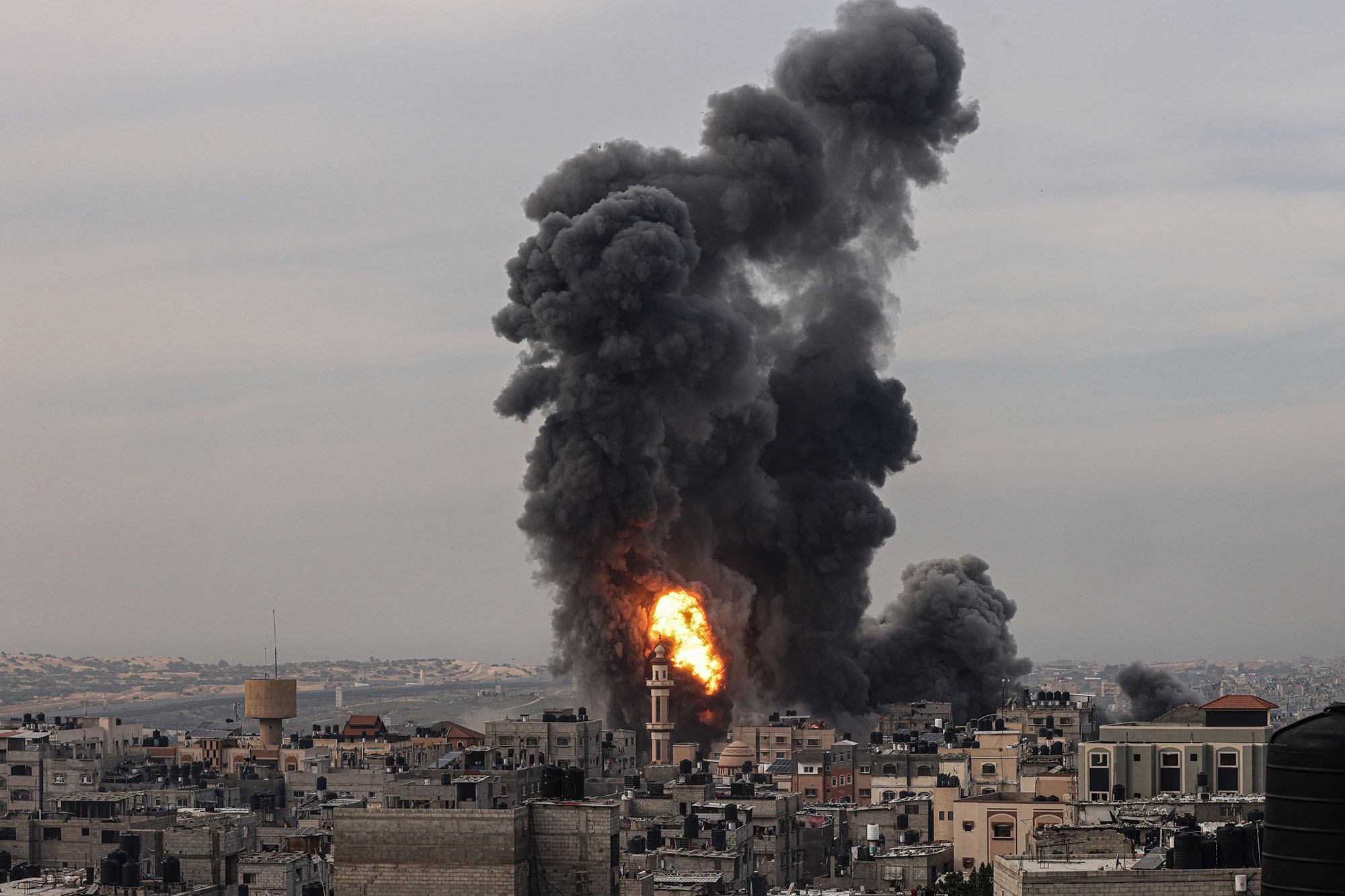 Smoke billows after an Israeli strike over Rafah, Gaza, on December 20.