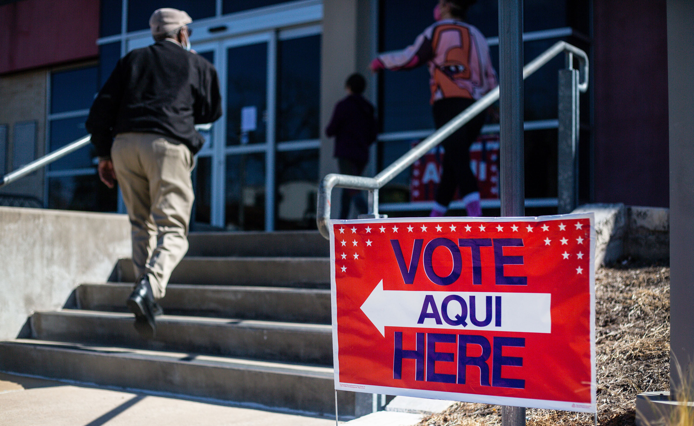 People vote at the Carver Branch Library in Austin, Texas, on Tuesday.