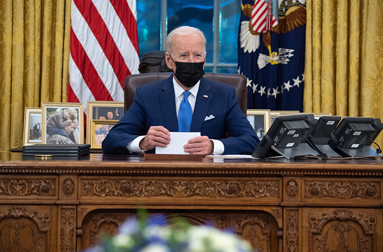 Biden speaks before signing executive orders related to immigration in the Oval Office on February 2. 