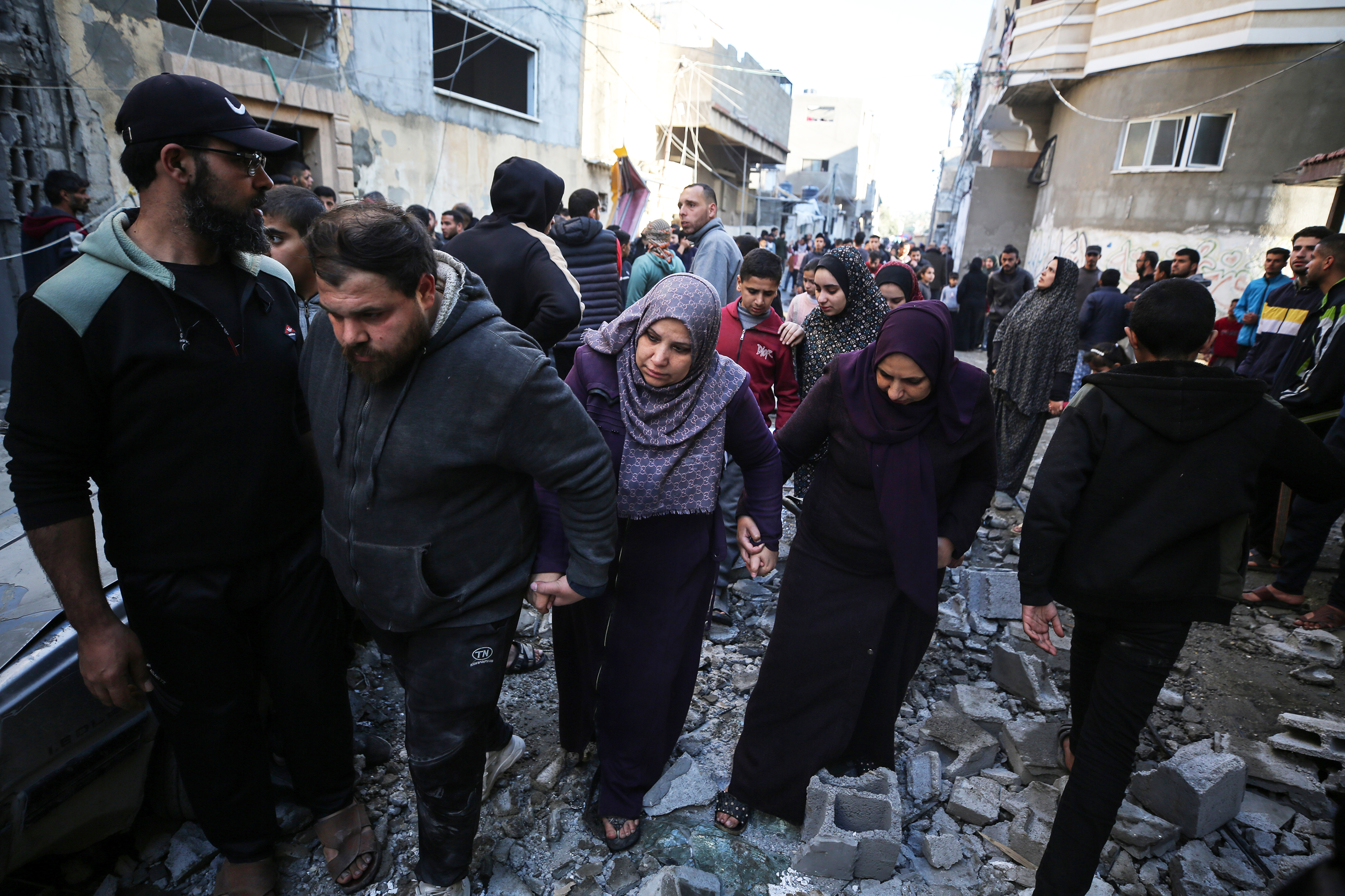 Palestinians inspects the damage caused by Israeli bombardment in Deir al-Balah, central Gaza, on February 17.