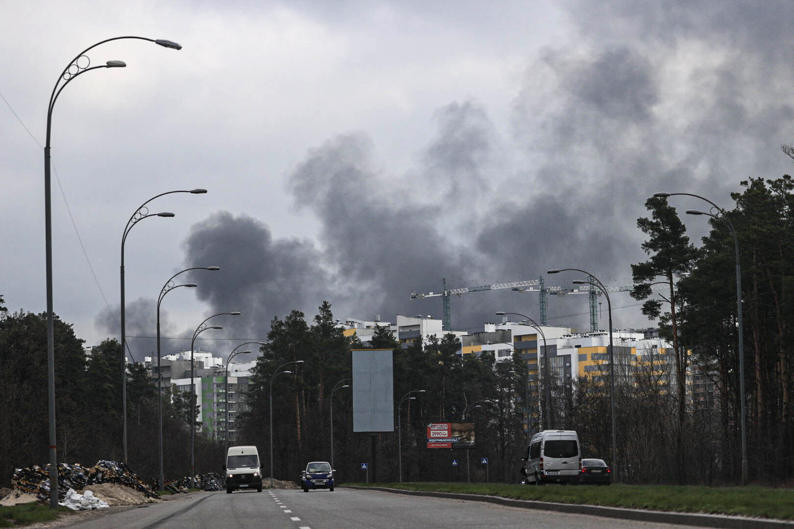 Smoke is seen rising over Kyiv, Ukraine, on Saturday, April 16. 