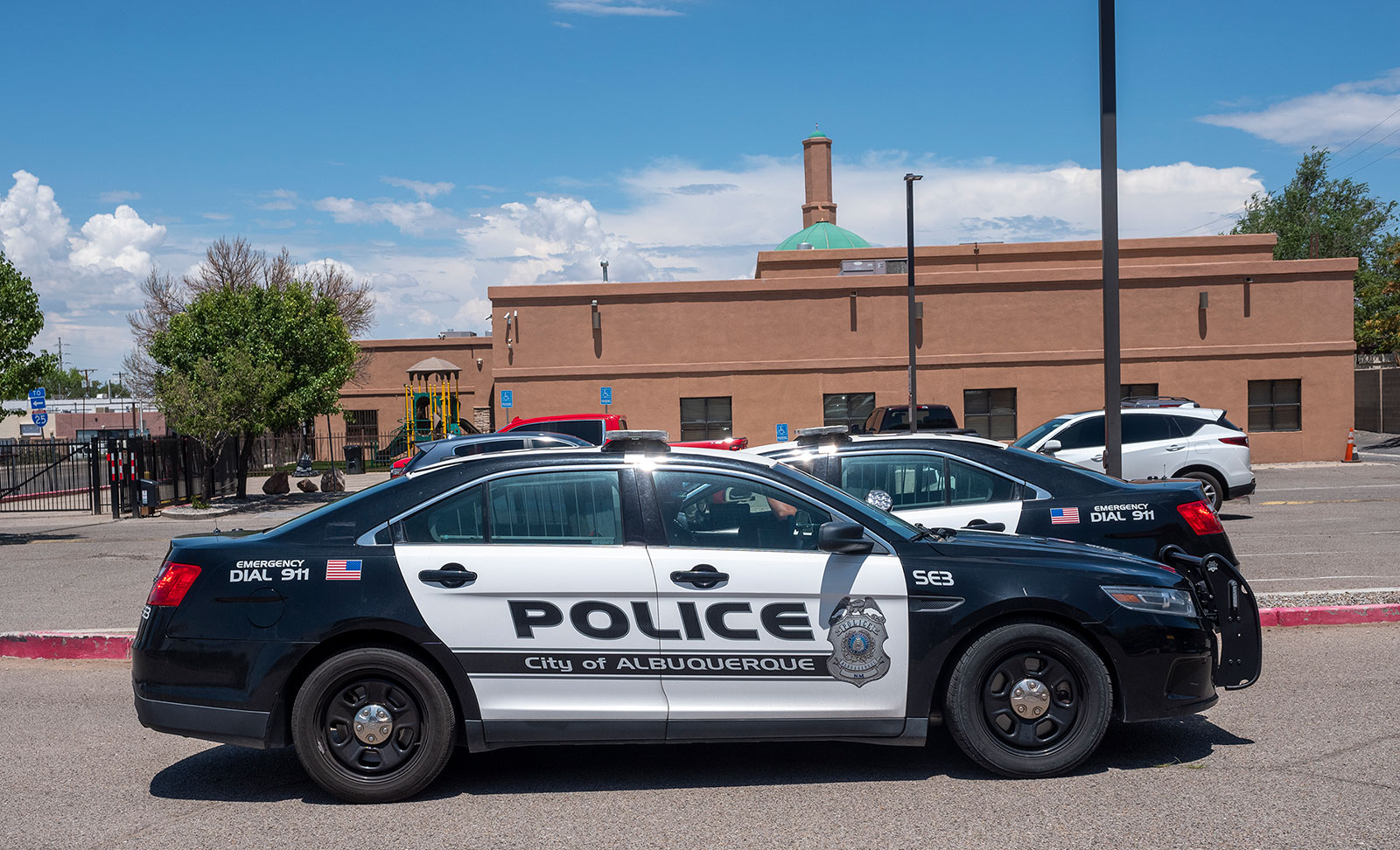 Albuquerque Police patrol the parking lot at the Islamic Center of New Mexico in Albuquerque on August 7. 