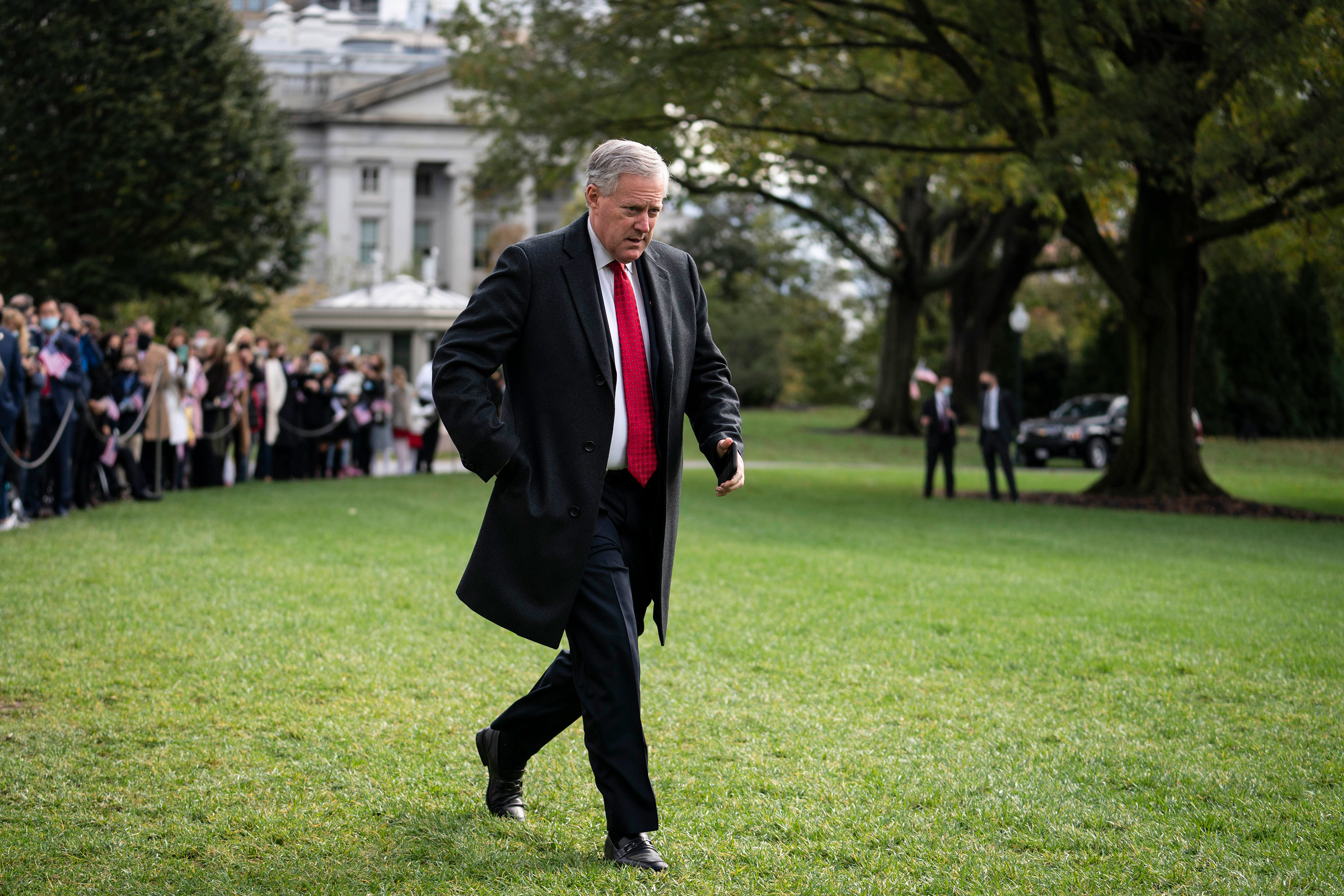 Former White House chief of staff Mark Meadows walks along the South Lawn in October 2020.