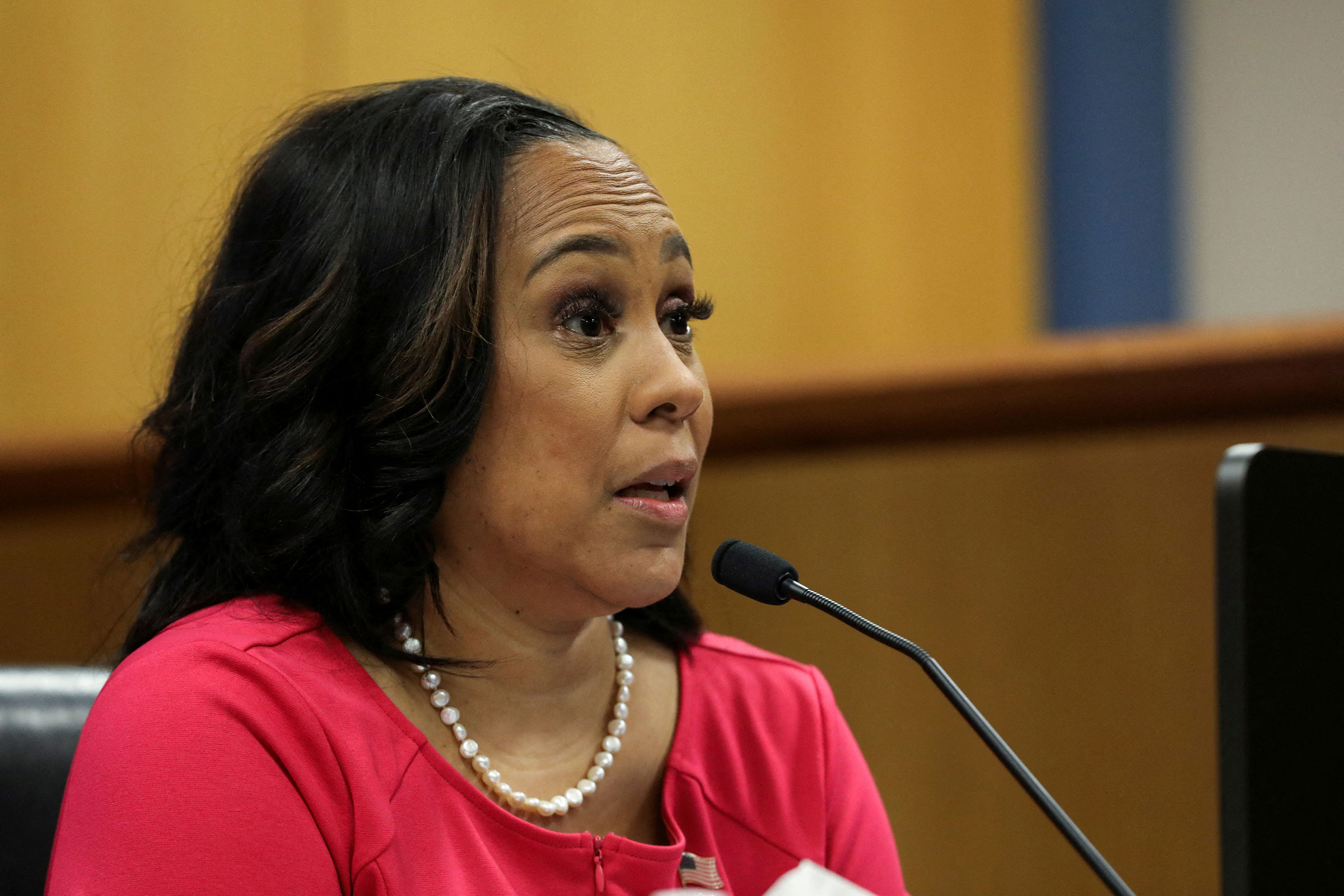 Attorney Fani Willis speaks during a hearing in the case of State of Georgia v. Donald John Trump at the Fulton County Courthouse in Atlanta on February 15.