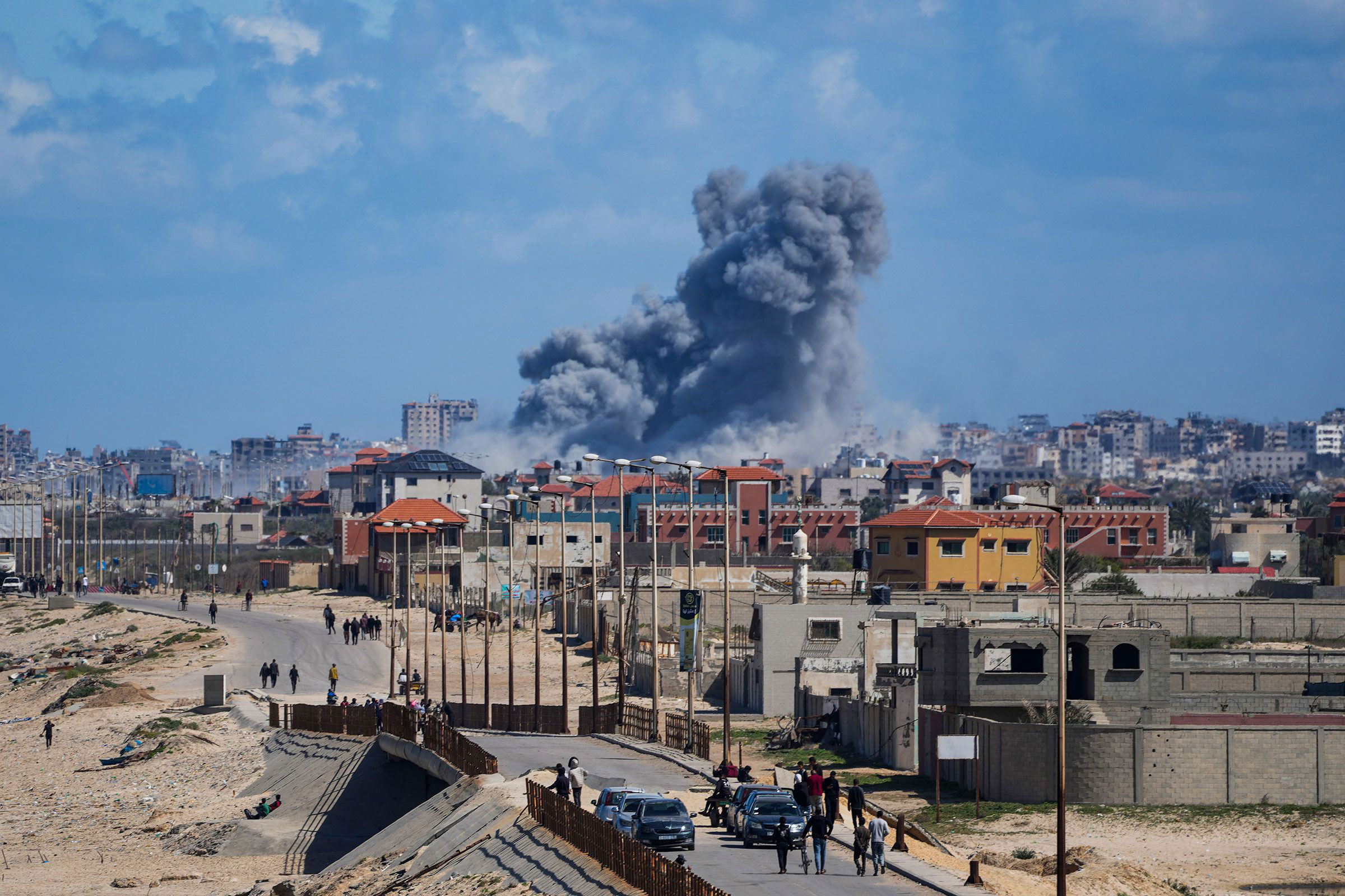 Smoke rises following an Israeli airstrike in central Gaza on March 15. 