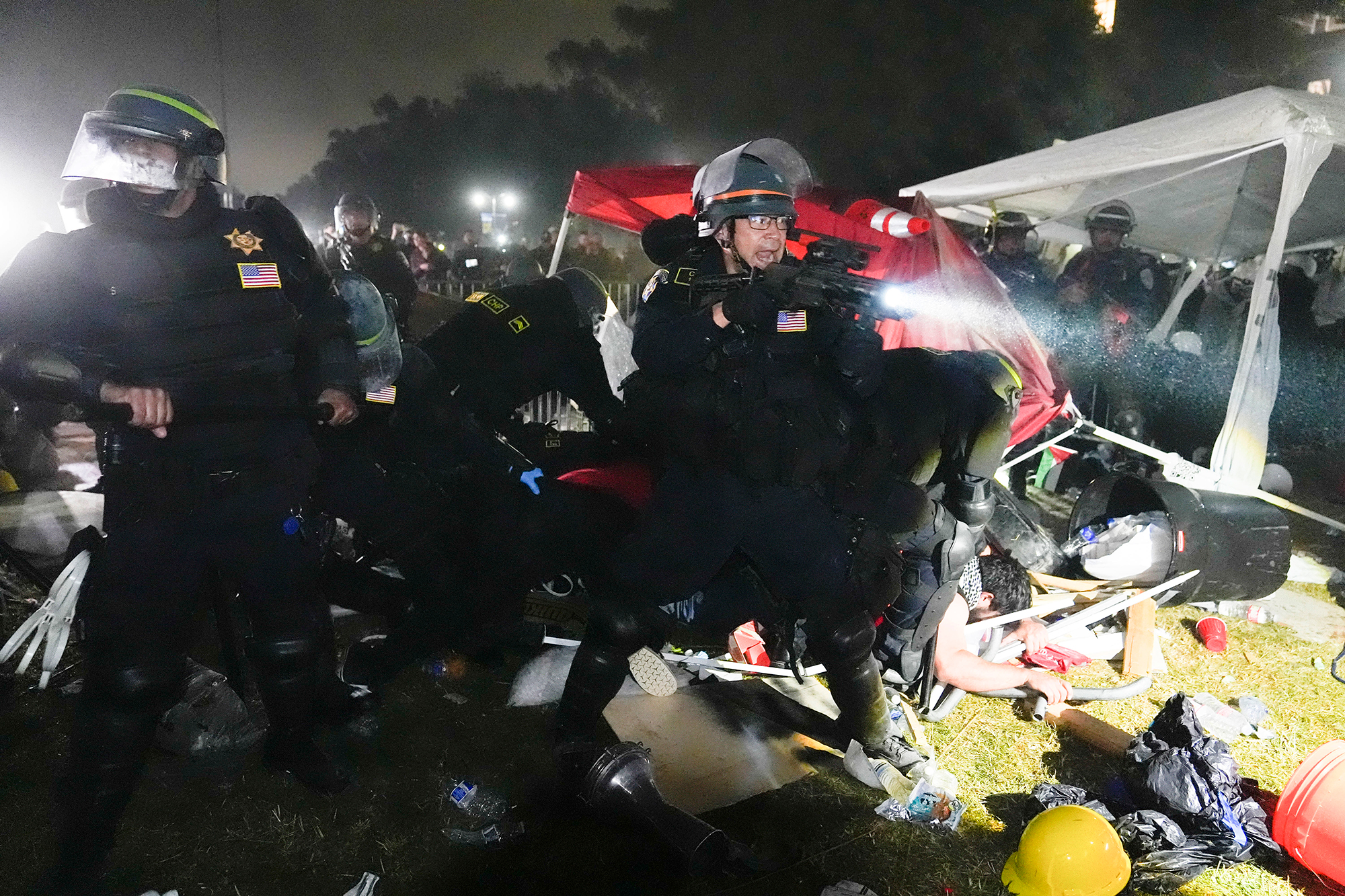 Police advance on pro-Palestinian demonstrators in an encampment on the UCLA campus on May 2. 