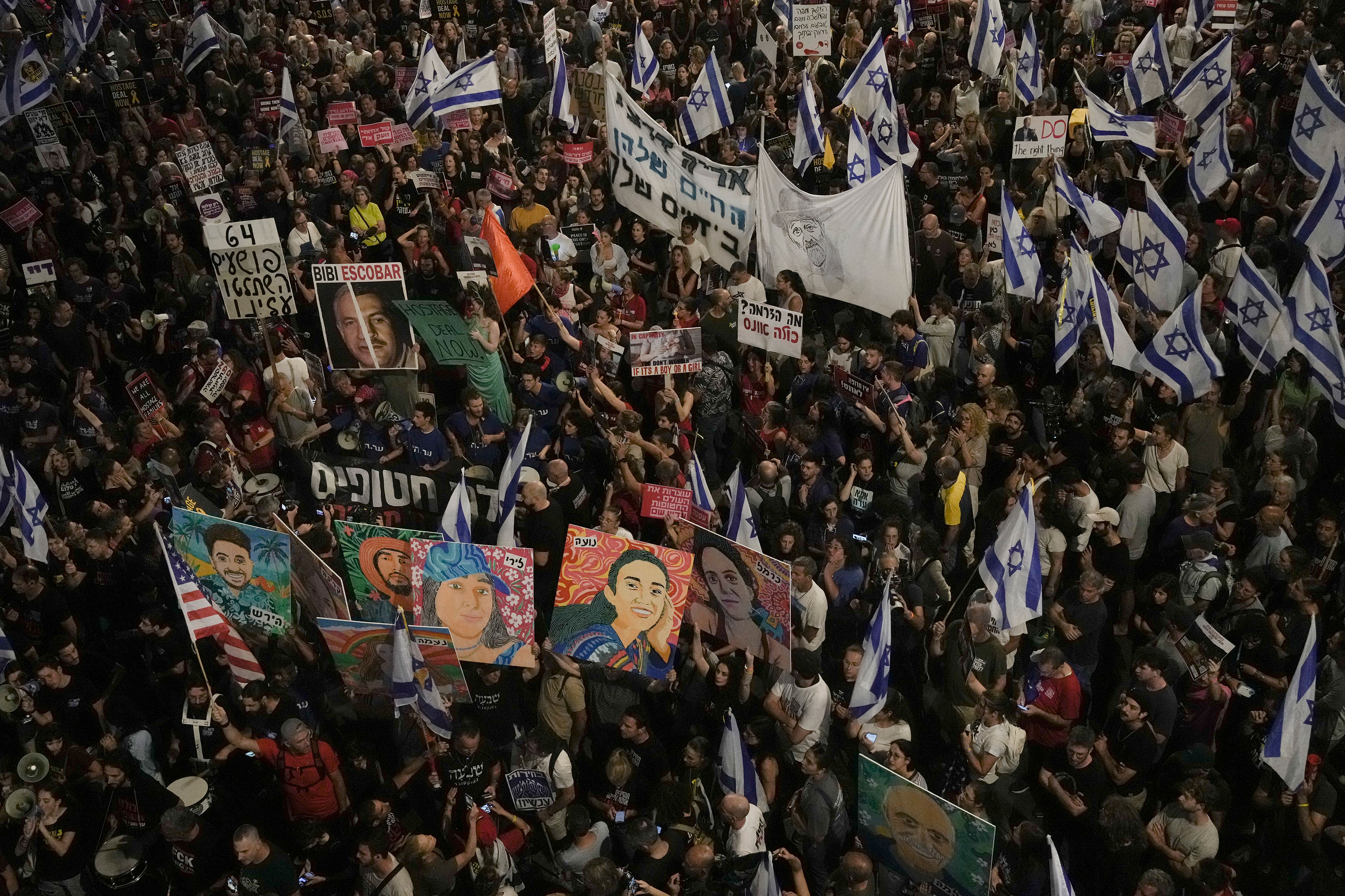 People protest against Israeli Prime Minister Benjamin Netanyahu's government and call for the release of hostages held in Gaza at a demonstration in Tel Aviv, Israel, on June 1. 