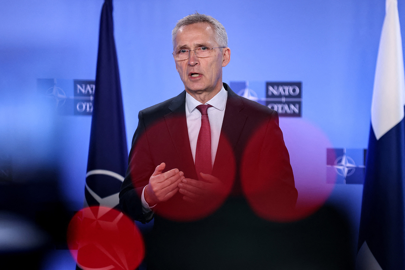 NATO Secretary General Jens Stoltenberg speaks during a joint press conference with to Finland's Foreign and Defense Ministers at the NATO headquarters in Brussels on March 20.